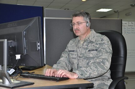 Lane Bourgeois, 332nd Air Expeditionary Wing historian, transcribes and edits a series of interviews conducted in Iraq, Jan. 6, 2012. In addition to 332nd AEW personnel, Bourgeois interviewed servicemembers at Camp Tarji and Imam Ali Air Base including a pararescueman, predator operator and maintenance chief. Once completed and signed by the interviewee, each transcript will appear on Bourgeois' monthly history report, which will be archived at the Air Force Historical Research Agency at Maxwell Air Force Base, Ala. (Photo by Senior Airman Melanie Holochwost)   
