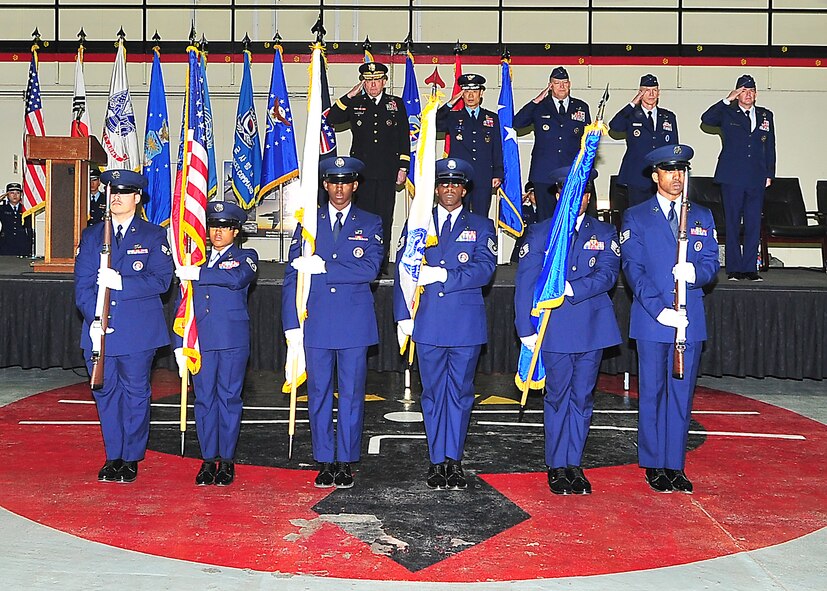 Members of the Osan Air Base Honor Guard present the colors during a change of command ceremony at Osan Air Base, Republic of Korea, Jan. 6, 2012.  Lt. Gen. Jan-Marc Jouas assumed command of the 7th Air Force from Lt. Gen. Jeffrey Remington. (U.S. Air Force photo/ Staff Sgt. Daylena Gonzalez)