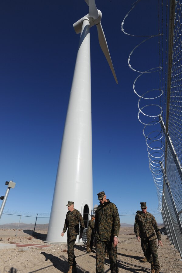 Colonel Daniel P. Ermer, Commanding Officer::r::::n::MCLB Barstow, accompanies new commanding::r::::n::general Brig. General Vincent A. Coglianese from::r::::n::the wind turbine after receiving a tour and a::r::::n::brief explaination of its use.