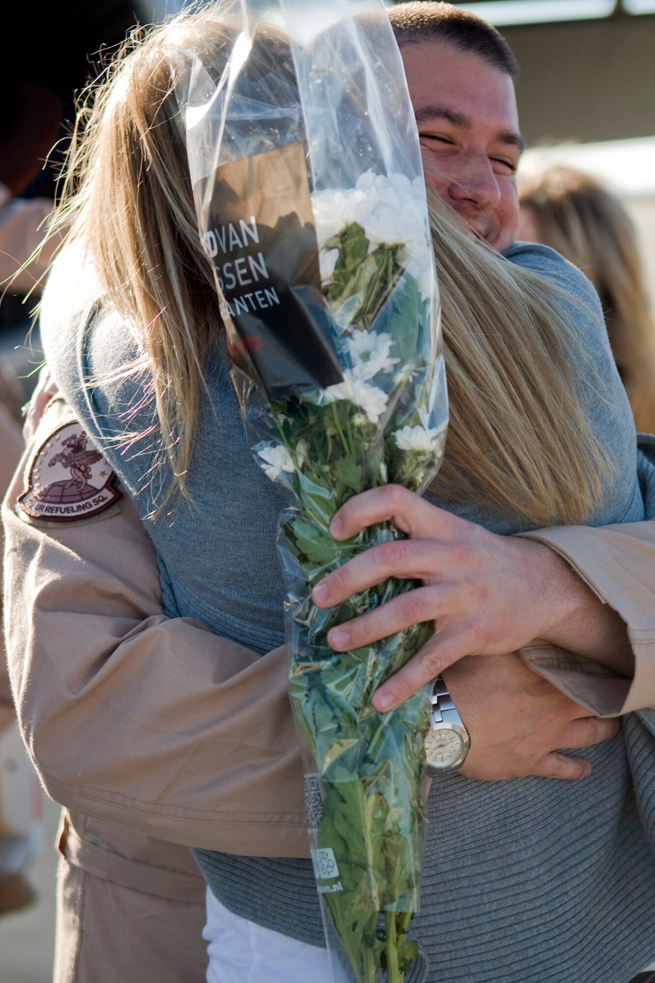 GRISSOM AIR RESERVE BASE, Ind. -- Capt. Jacob Creel, 72nd Air Refueling Wing pilot, embraces his wife Stephanie after returning to Grissom from a deployment to Southwest Asia. Creel deployed with several other 434th Air Refueling Wing Airmen for over two months in support of Operations Enduing Freedom and Odyssey Dawn. (U.S. Air Force photo/Tech. Sgt. Mark R. W. Orders-Woempner)
