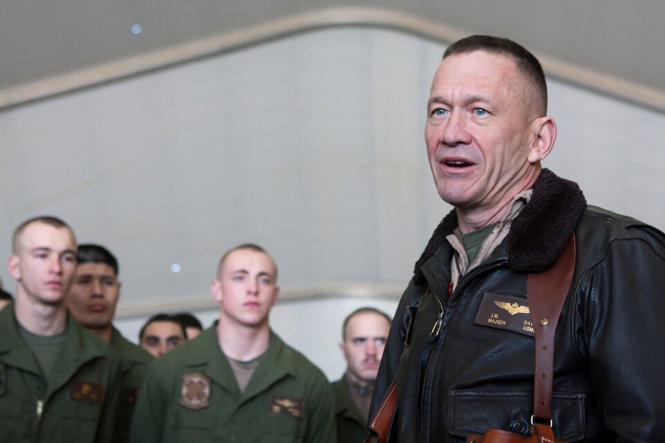 Maj. Gen. Jon M. Davis, right, 2nd Marine Aircraft Wing commanding general, speaks to the Marines of Marine Heavy Helicopter Squadron 363 at Camp Bastion, Afghanistan, Jan. 8. Davis visited Camp Bastion to present awards to Marines of HMH-363 in recognition of their performance supporting operations in southwestern Afghanistan with 2nd Marine Aircraft Wing (Forward).::r::::n::To connect with the Marines in Afghanistan visit http://www.facebook.com/regionalcommandsouthwest::r::::n::