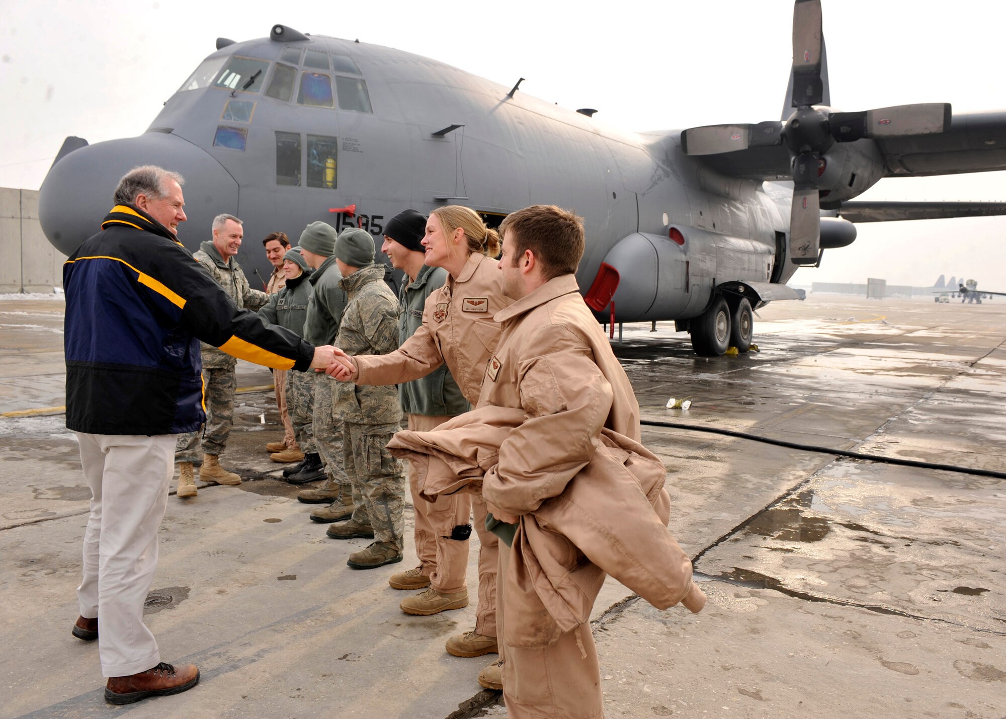 BAGRAM AIRFIELD, Afghanistan-- Honorable Frank Kendall meets members of the 455th Aircraft Maintenance Squadron EC-130 Aircraft Maintenance Unit at Bagram Airfield, Afghanistan, Jan. 8, 2012. Kendall is principal deputy under secretary of defense for Acquisition, Technology and Logistics and he visited Bagram to show his support for deployed troops. (U.S. Air Force photo/ Airman 1st Class Ericka Engblom)