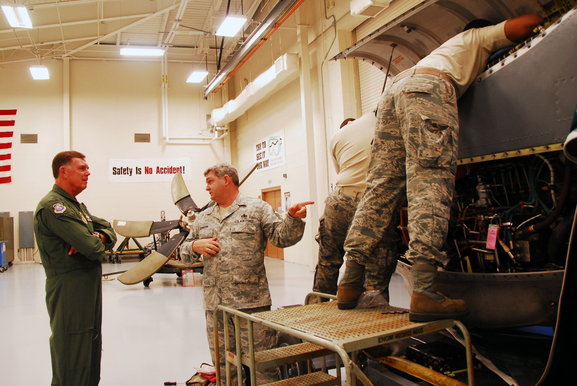 Maj. Gen. Wallace W. "Wade" Farris, Jr., 22nd Air Force commander, tours the propulsions shop of the Roberts Maintenance Facility while visiting the 403rd Wing. Senior Master Sgt. Johnson explains to the general the responsibilities of the airmen in the shop. (U.S. Air Force Photo/Staff Sgt. Tabitha Dupas)