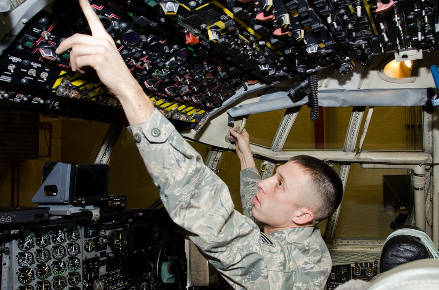 Tech. Sgt. Fred Pierce, 139th Aircraft Maintenance Squadron crew chief, checks the control panel in the flight deck of a C-130 Hercules at Rosecrans Air National Guard Base, St. Joseph, Mo., on Dec. 29, 2011. Pierce was selected as the Outstanding Noncommissioned Officer of the Year for the Missouri Air National Guard. (Missouri Air National Guard photo by Staff Sgt. Michael Crane)