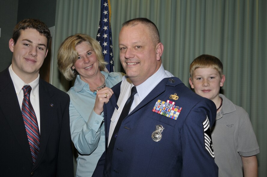 Michael Sullivan is promoted to Chief Master Sergeant in the New Hampshire Air National Guard NH ANG) during a ceremony at Pease Air National Guard Base, Newington, New Hampshire.  The ceremony was attended by numerous members of the NH ANG, family and friends in addition to members of a local Police Department.  Pease Air National Guard Base, Newington, New Hamphire., Jan. 8, 2012. (Photo by MSgt. Timothy W. Psaledakis, NH Air National Guard/Released)
