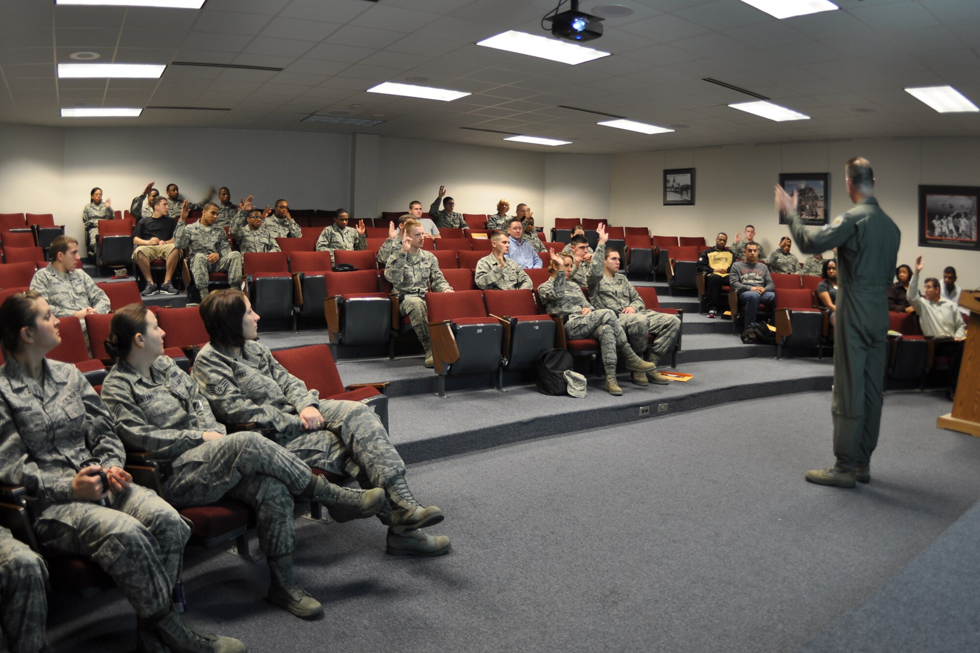 Col. Eric Overturf, the commander of the 442nd Fighter Wing at Whiteman Air Force Base, Mo., addresses a group of "newcomers" at the 307th Bomb Wing headquarters building during the Unit Training Assembly weekend Jan. 7, 2012. Overturf was at Barksdale visiting the 917th Fighter Group, which is a geographically separate unit (GSU) under the command structure of the 442nd FW. The Reserve "newcomers" included new recruits to the Air Force as well as prior-service individuals returning to military service or transferring from other units across the country. The Reserve units at Barksdale average 30-40 new people each month. (U.S. Air Force photo by Master Sgt. Jeff Walston/Released)  