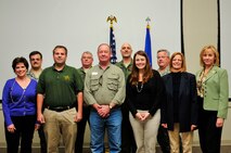 The 919th Special Operations Wing’s new honorary commanders pose for a group photo with the Reserve unit’s senior leaders during the recent induction ceremony at Duke Field, Fla.  Front row from left:  Pamela Woodall, Beach Community Mortgage; Jason Stokes, New Beginnings Church; Richard Harless, Beach Community Mortgage; Jackie Blue, Cayo Grande Suites Hotel; Peggy Moravec, Four Points by Sheraton; and Angela Campbell, Navarre Area Board of Realtors.  Back row from left:  Colonels Houston Sewell, 919th Support Group commander; Don Buckley, 919th Operations Group commander;  Andy Comtois, 919th SOW commander;  and Ken Honaker, 919th Maintenance Group commander.  (Not shown: Col. (Dr.)  Edward Seeliger, 919th Medical Squadron commander).  The honorary commanders program allows local community members a unique opportunity to interact with and learn about the wing’s Citizen Commandos, their mission and the role they play in supporting the Air Force. Honoraries may invite commanders to community functions, building and maintaining positive relationships between the military and local communities. (U.S. Air Force photo/Tech. Sgt. Samuel King Jr.)  