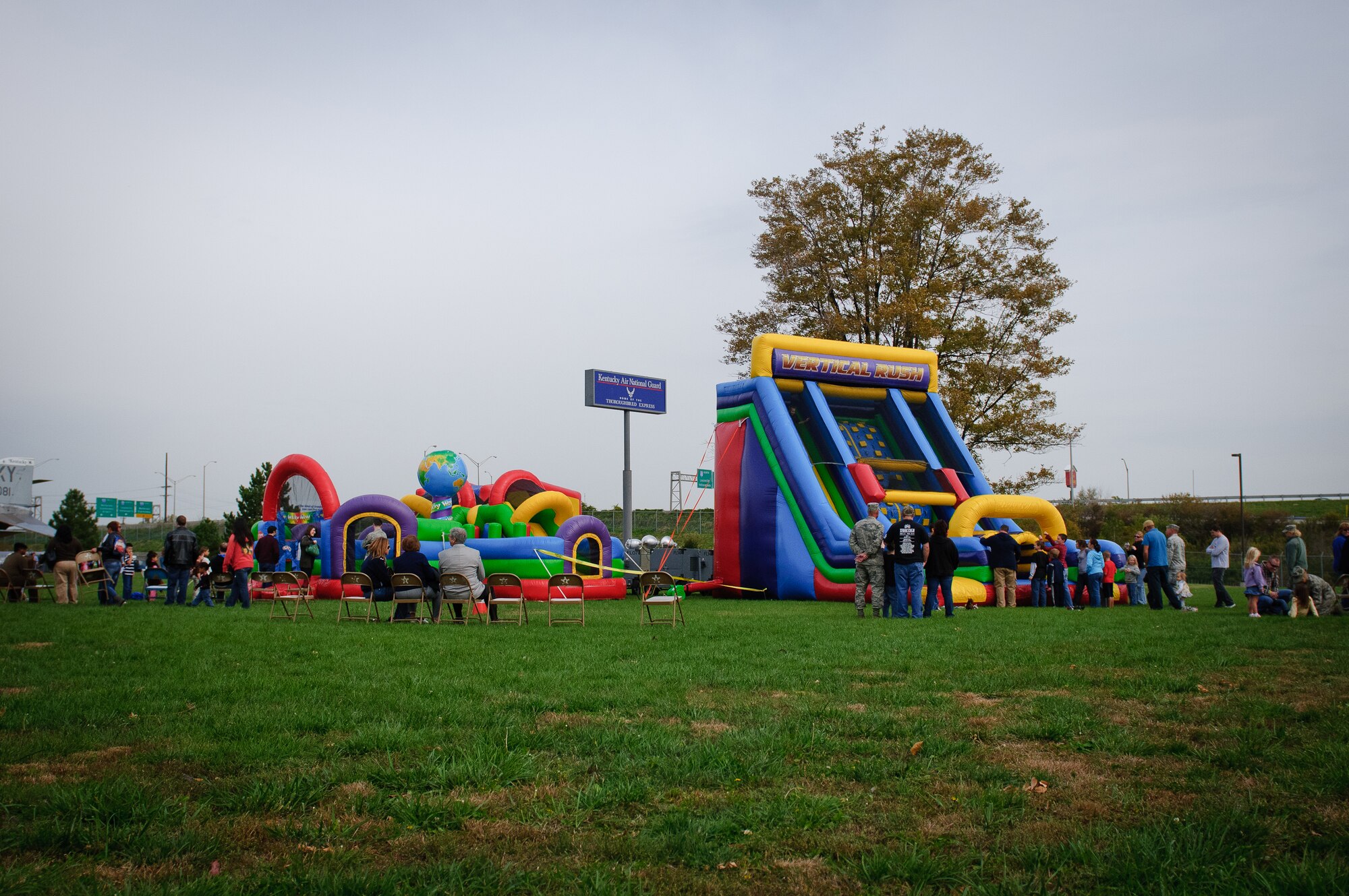 More than 1,000 Kentucky Air National Guardsmen and their family members attended the 123rd Airlift Wing's annual Family Day celebration Oct. 23, 2011, in Louisville, Ky. Activities included a corn hole tournament, children's games, live music and rides in the wing's Mini C-130, a customized golf cart designed to replicate the transport aircraft. (U.S. Air Force photo by Senior Airman Maxwell Rechel)
