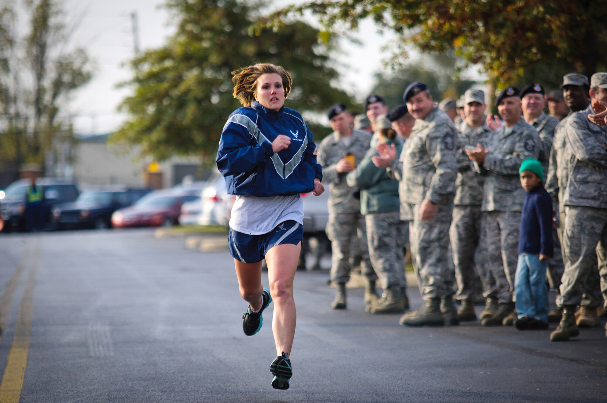 Senior Airman Brandy Craig, a fire team member from the 123rd Security Forces Squadron, competes in the Base Fitness Challenge held Oct. 23, 2011, at the Kentucky Air National Guard Base in Louisville, Ky. More than 60 Airmen from the 123rd Airlift Wing participated in the third-annual event, which featured a relay race, sit-ups and push-ups. (U.S. Air Force photo by Master Sgt. Phil Speck)