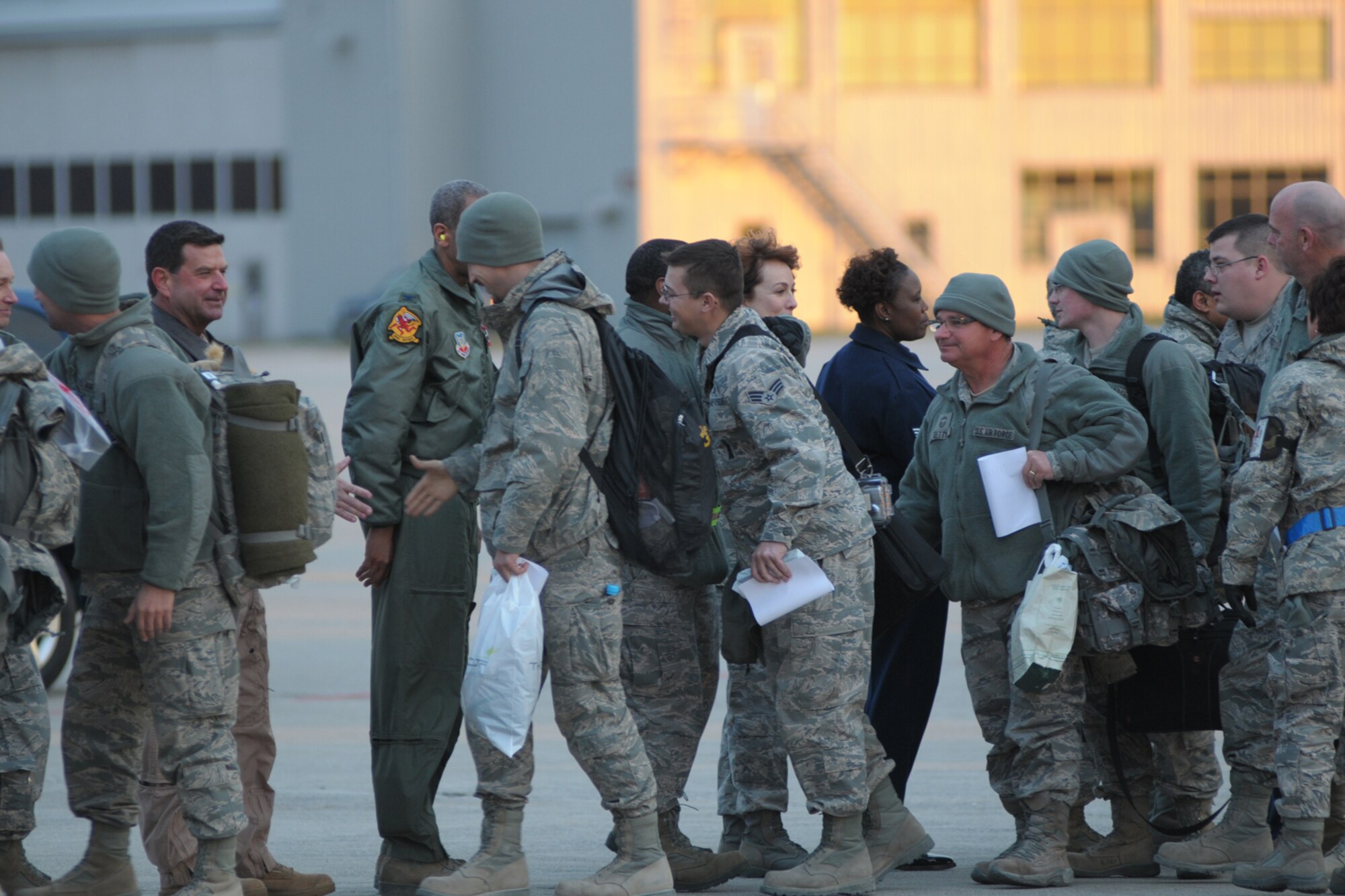 Airmen from the 127th Wing arrive at Selfridge Air National Guard Base, Mich., Jan. 9, 2012, after a 4-month deployment to Kandahar Airfield in Afghanistan. The Airmen, all members of the 127th Wing at Selfridge, flew and maintained the A-10 Thunderbolt II attack aircraft while in Afghanistan. (U.S. Air Force photo by SSgt Rachel Barton)