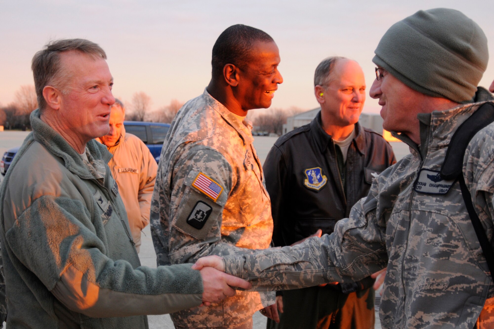 Col. Michael Thomas welcomes home members of the Michigan Air National Guard at Selfridge Air National Guard Base, Mich., Jan. 9, 2012. The Airmen returned home after a 4-month deployment to Afghanistan, where they flew, maintained and supported the A-10 Thunderbolt II aircraft. The Airmen are all members of the 127th Wing at Selfridge, of which Thomas is the commander. (U.S. Air Force photo by TSgt Dave Kujawa)