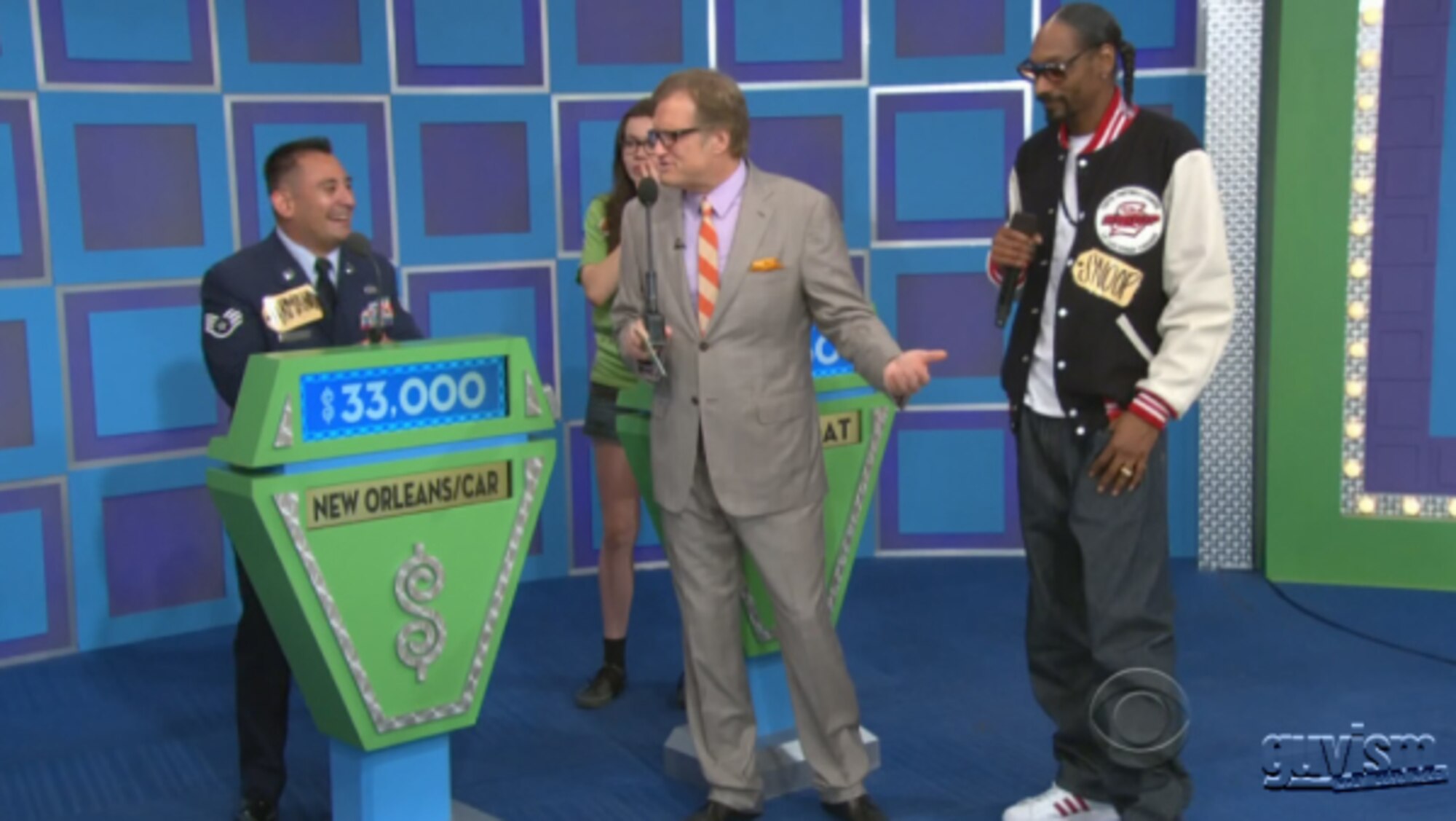VANDENBERG AIR FORCE BASE, Calif. -- Tech. Sgt. Armando Galaviz II, Vandenberg Fire north battalion chief, talks to Drew Carey, game show host, Aug. 24, at the “Price is Right” studio in Burbank Calif.  Galaviz won the grand prize worth more than $33,000.
 (Courtesy Photo)  
