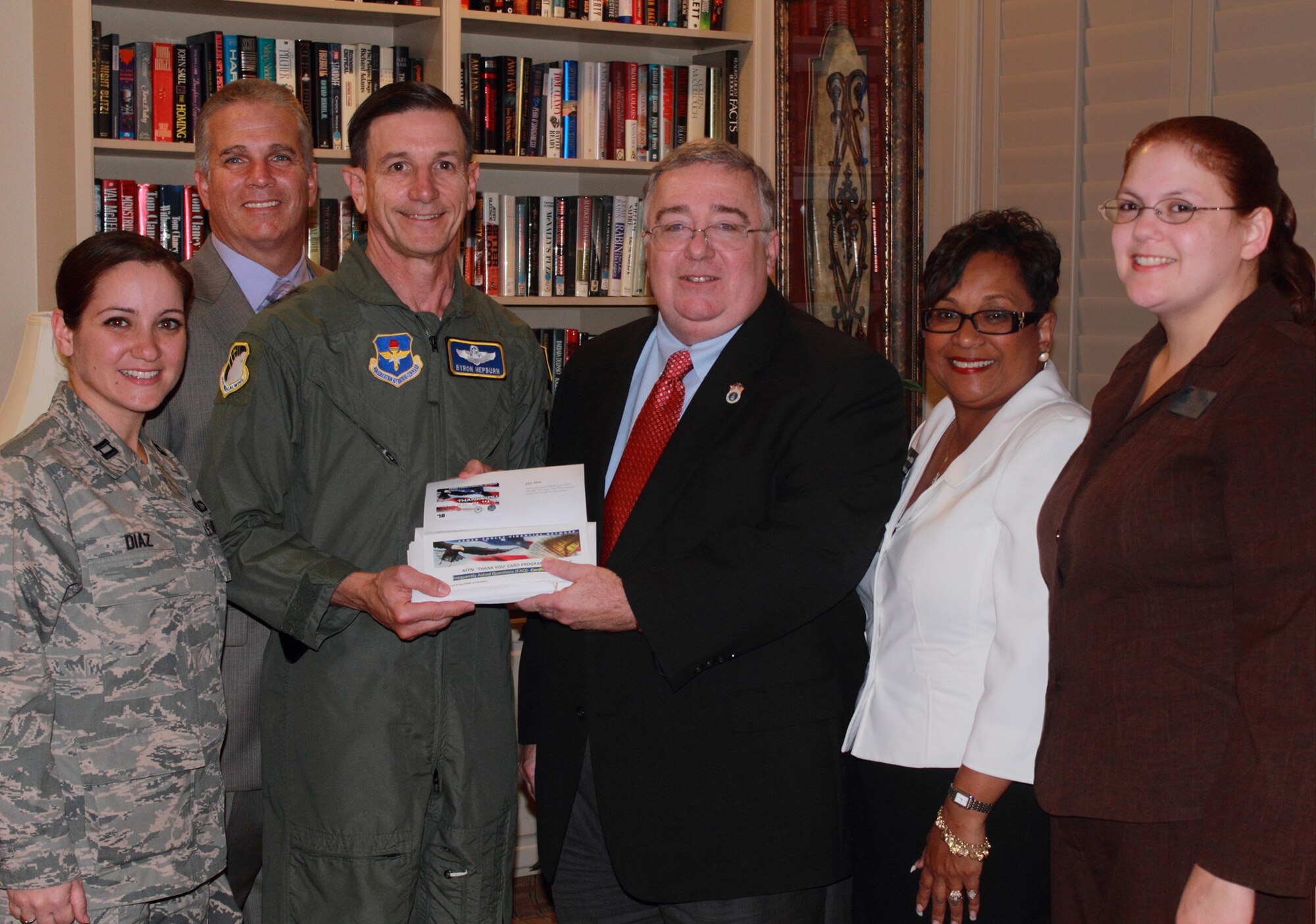 Lackland financial institutions donate to Fisher House > 59th Medical Wing  > Article Display
