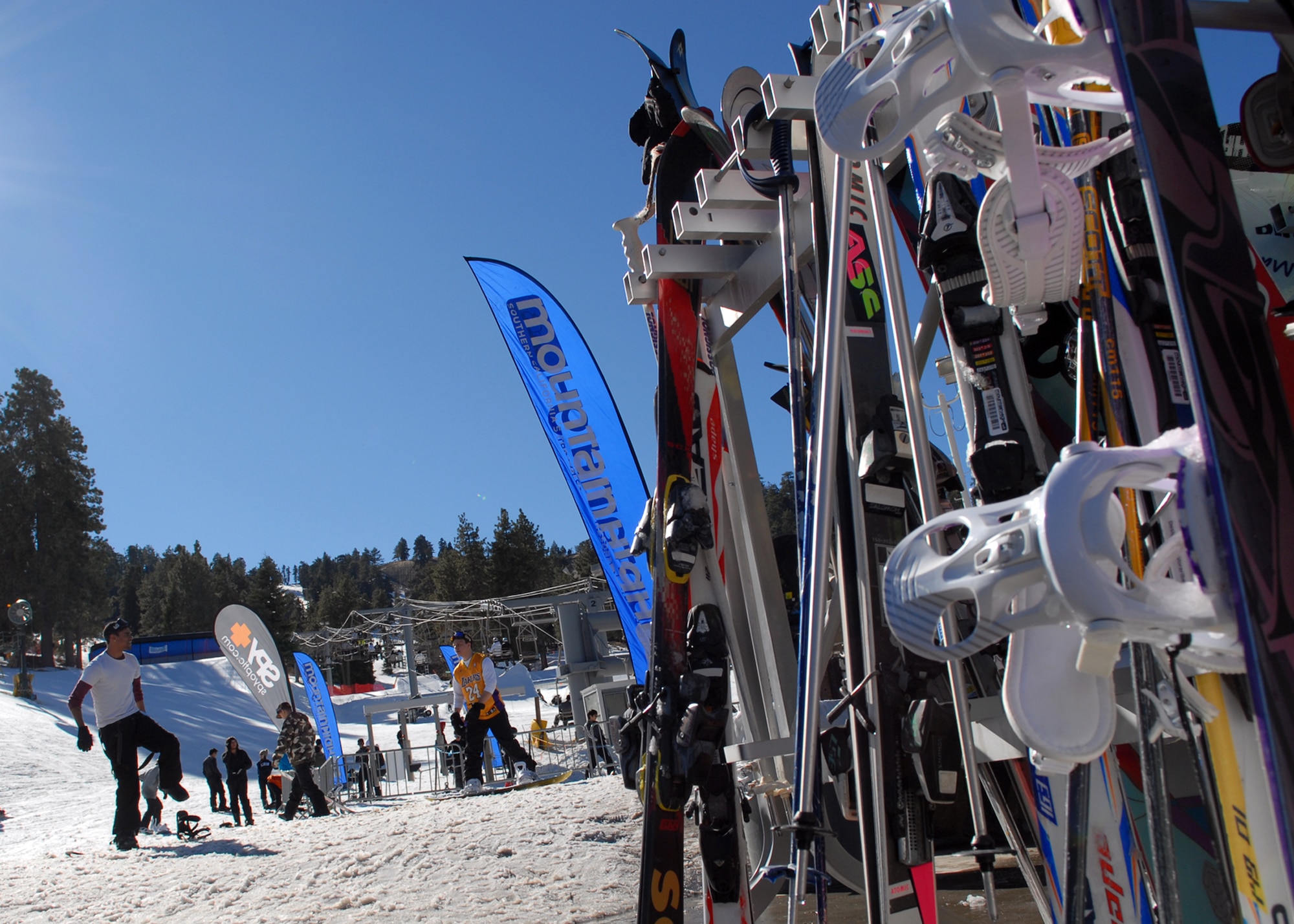 Ski equipment waits at the bottom of a run at Mountain High winter resort in Wrightwood, Calif. Team Edwards members without equipment can take advantage of Outdoor Recreation’s ski and snowboard winter rental deals. Items for rent include complete ski and snowboard packages, helmets, jackets, pants and gloves in addition to other winter equipment. (U.S. Air Force photo by Kate Blais)