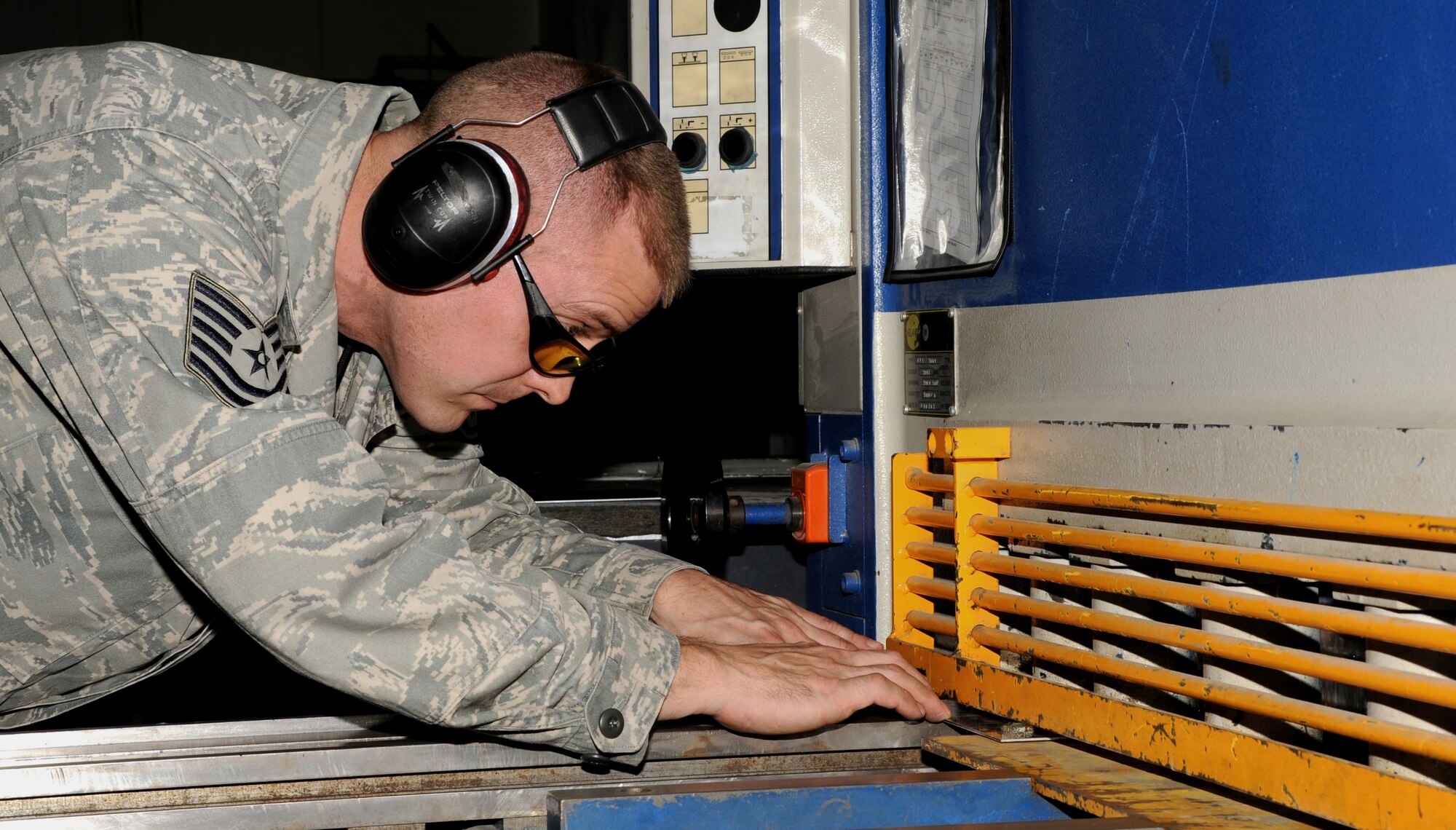 SOUTHWEST ASIA - Tech. Sgt. Blair Austinson squares a wing component for an E-3 Sentry at the fabrication flight Jan. 6, 2012. Aircraft structural maintenance Airmen like Austinson are vital to keeping aircraft serviceable. Austinson, a Corbett, Ore. native assigned to the 380th Expeditionary Maintenance Squadron, is deployed from Kadena Air Base, Japan. (U.S. Air Force photo/Tech. Sgt. Arian Nead)