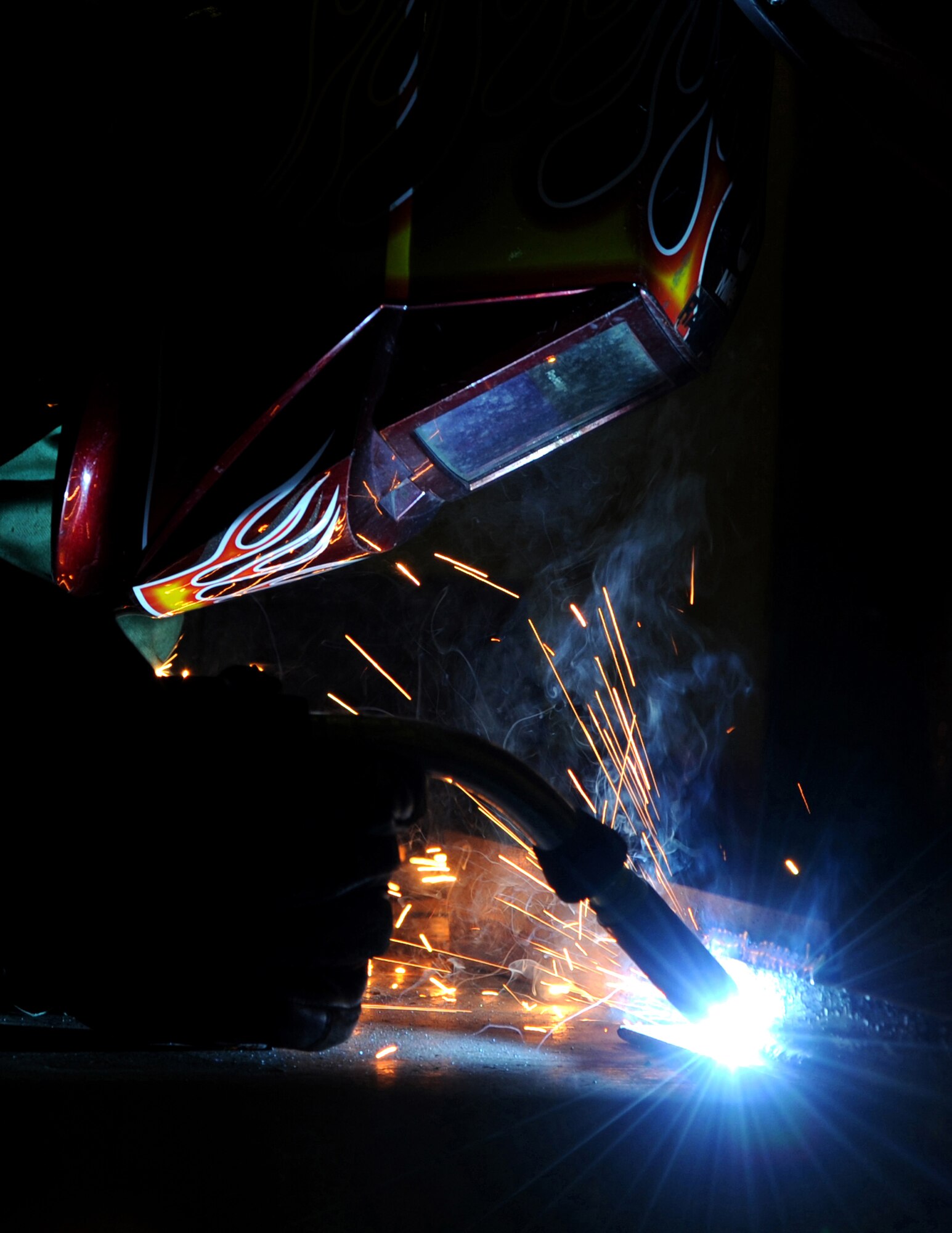 SOUTHWEST ASIA - Senior Airman Andrew Rahke welds steel beams for F-15C Eagle external fuel tank stands at the fabrication flight Jan. 6, 2012. Metals technology Airmen like Rahke are vital to keeping aircraft serviceable. Rahke is assigned to the 380th Expeditionary Maintenance Squadron, deployed from Kadena Air Base, Japan. (U.S. Air Force photo/Tech. Sgt. Arian Nead)