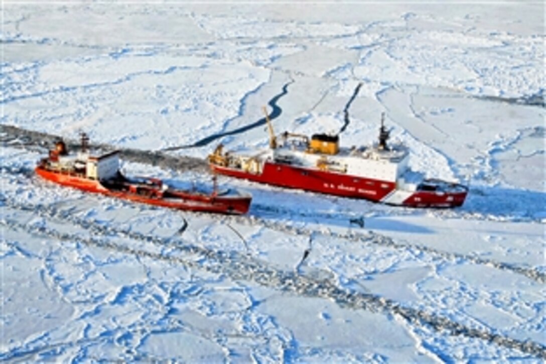 The Coast Guard Cutter Healy breaks ice around Renda, a Russian-flagged tanker, 250 miles south of Nome, Alaska, Jan. 6, 2012. Healy is the Coast Guard's only operating polar icebreaker.