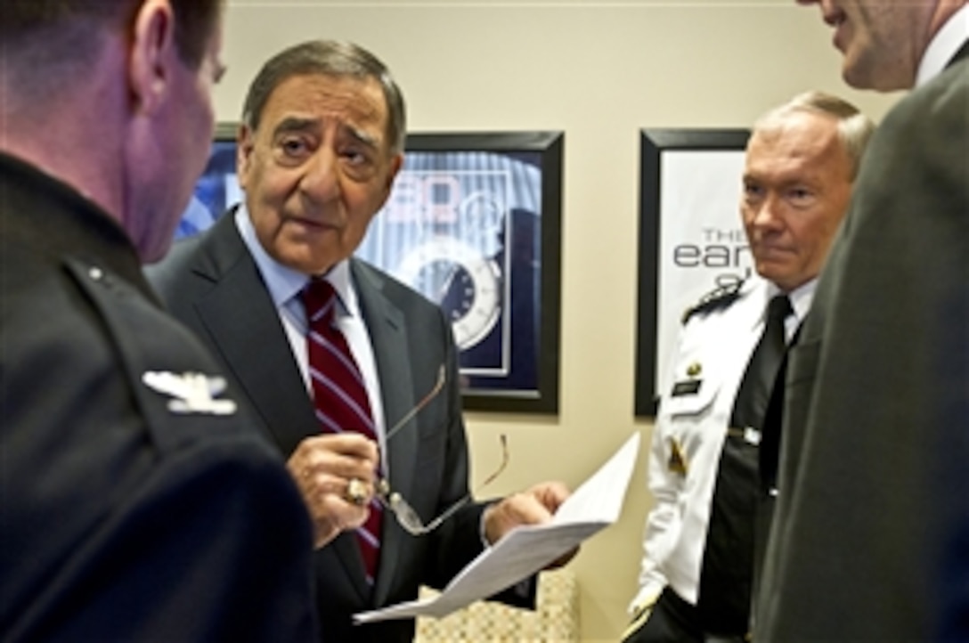 Defense Secretary Leon E. Panetta and Army Gen. Martin E. Dempsey, chairman of the Joint Chiefs of Staff, prepare for an interview on "Face the Nation," a CBS news program, in Washington, D.C., Jan. 6, 2012. Panetta and Dempsey responded to a range of questions on defense issues for the program, which aired Jan. 8.