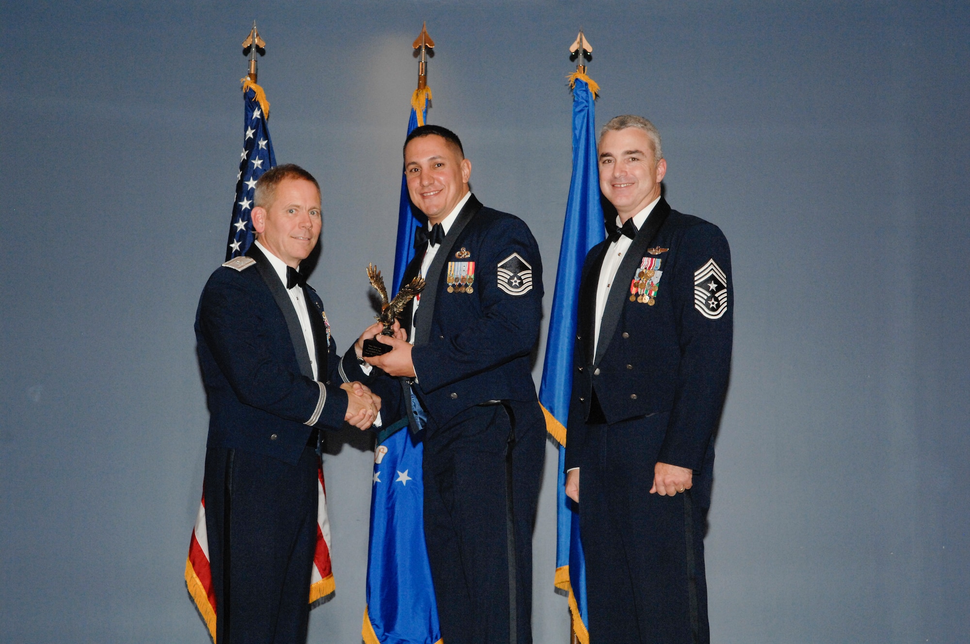 Base Honor Guard Program Manager of the Year was awarded to Master Sgt. Raymond Delgado, 325th Force Support Squadron honor guard superintendent, in a ceremony Jan. 6 at the Heritage Club. (U.S Air Force photo by Chris Cokeing)