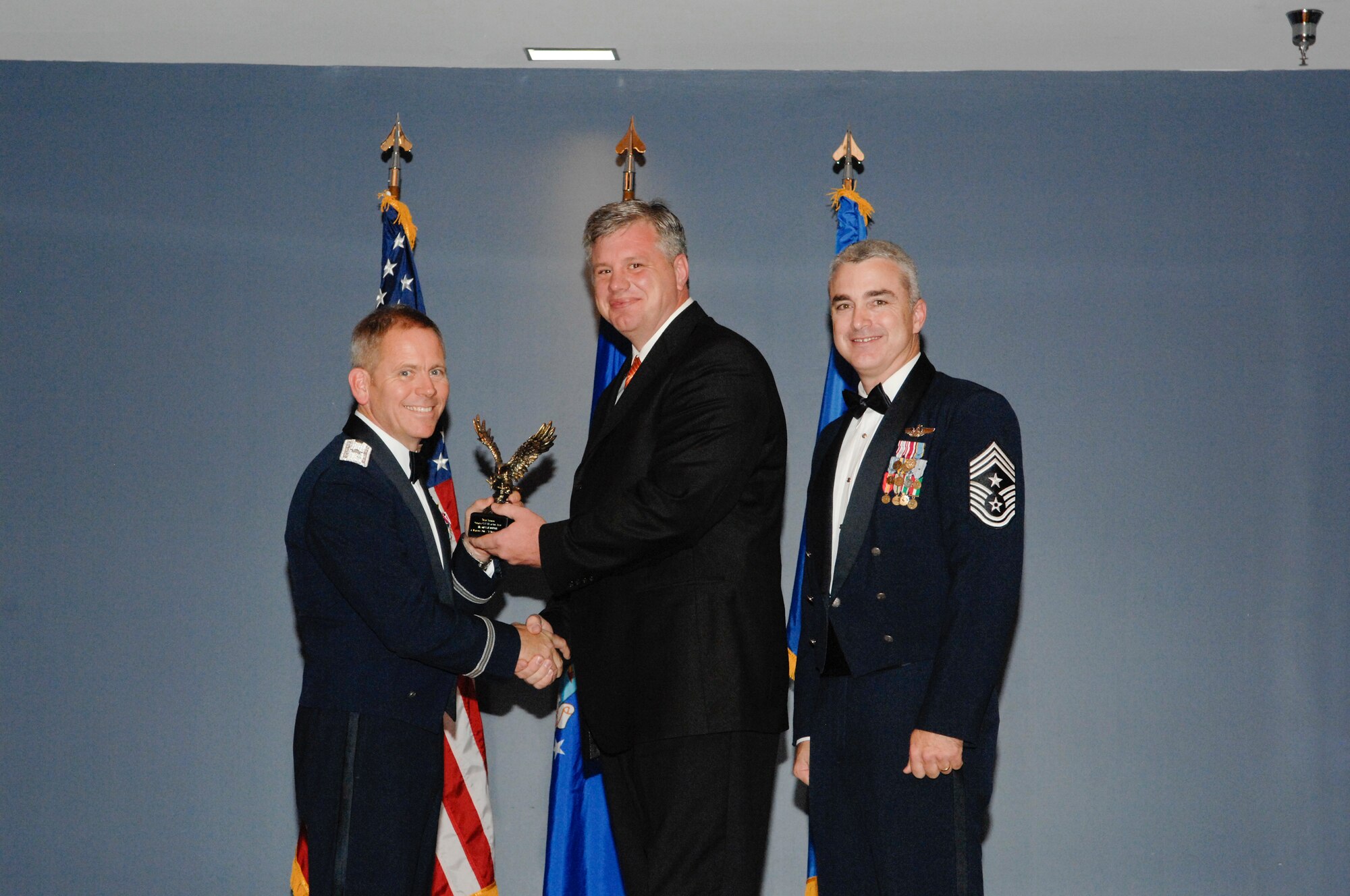 Civilian Category III of the Year was awarded to Mr. Grant W. Burris, 83rd Fighter Weapons Squadron combat archer technical advisor, in a ceremony Jan. 6 at the Heritage Club. (U.S Air Force photo by Chris Cokeing)