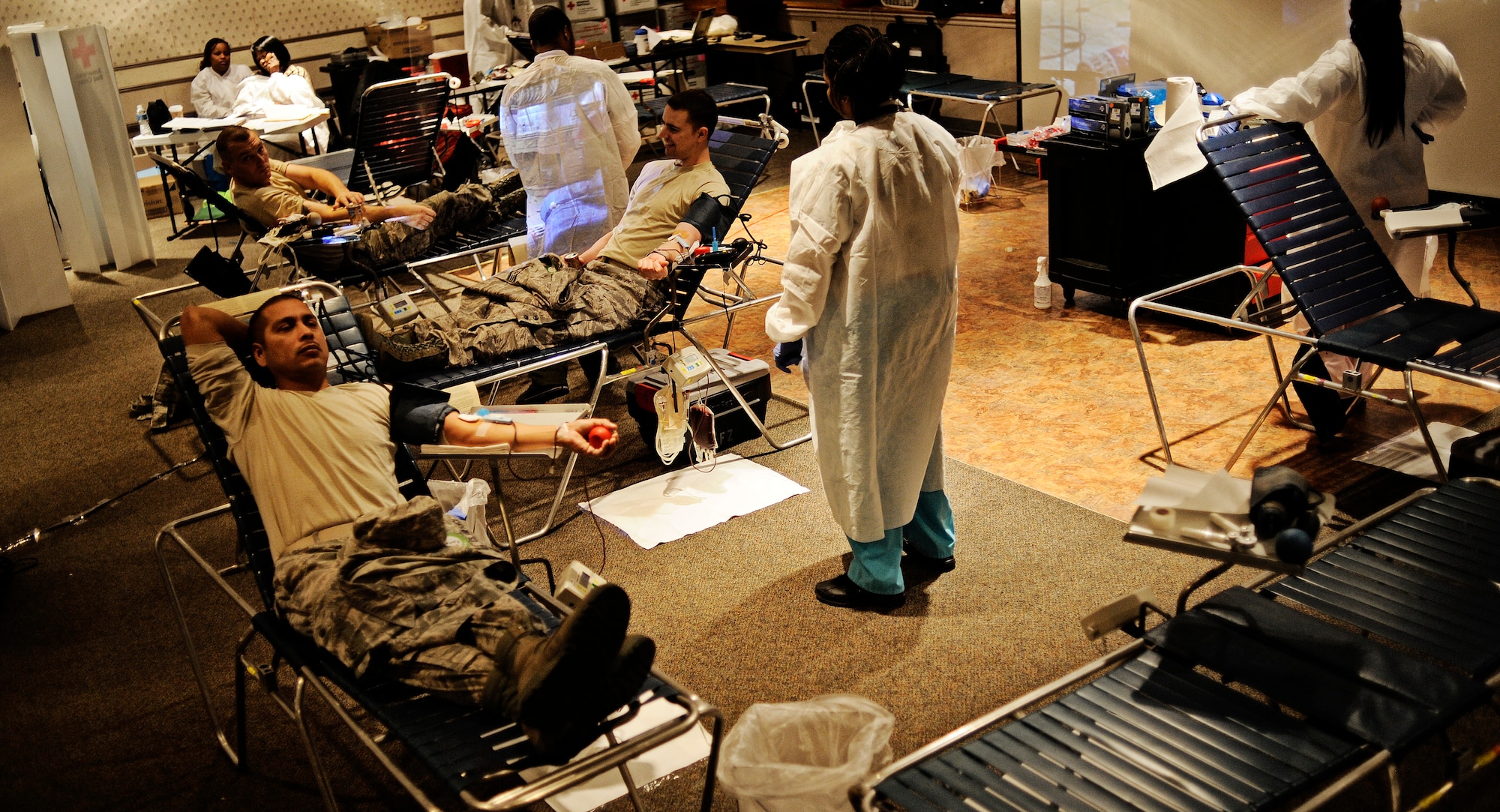Airmen from Scott Air Force Base take time out of their day to donate blood during the first blood drive of the year Jan. 10, 2012. Last year Scott AFB donated more than 950 units of blood, but Col. Michael Hornitschek, 375th Air Mobility Wing commander, wants to beat that goal this year and has set a goal of 120 units for the opening blood drive. (U.S. Air Force photo/ Staff Sgt. Ryan Crane)