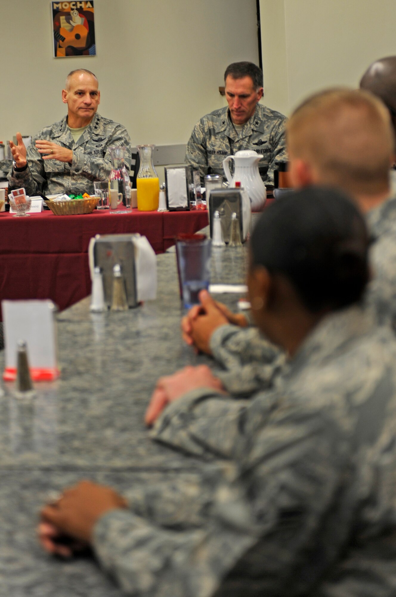 WHITEMAN AIR FORCE BASE, Mo. - Lt. Gen. James Kowalski, Air Force Global Strike Command commander, speaks to Whiteman Airmen during a base visit Jan. 6 as Brig. Gen. Scott Vander Hamm, 509th Bomb Wing commander, looks on. Kowalski answered Airmen's questions about deployment taskings, training experience and military force structure reshaping. (U.S. Air Force photo/Staff Sgt. Alexandra M. Boutte)