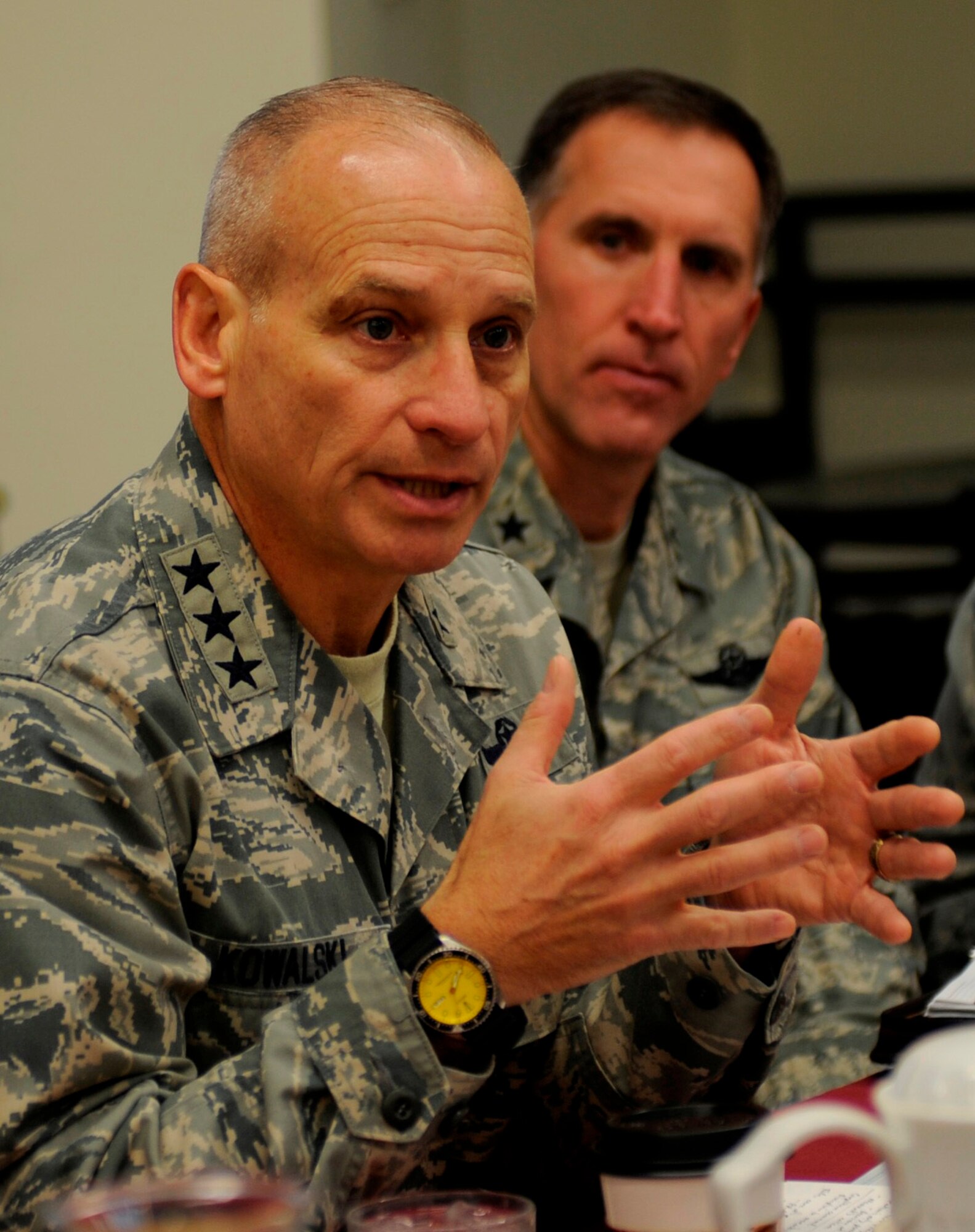 WHITEMAN AIR FORCE BASE, Mo. - Lt. Gen. James Kowalski, Air Force Global Strike Command commander, speaks to Whiteman Airmen during a base visit Jan. 6 as Brig. Gen. Scott Vander Hamm, 509th Bomb Wing commander, looks on. Kowalski answered Airmen's questions about deployment taskings, training experience and military force structure reshaping. (U.S. Air Force photo/Staff Sgt. Alexandra M. Boutte)