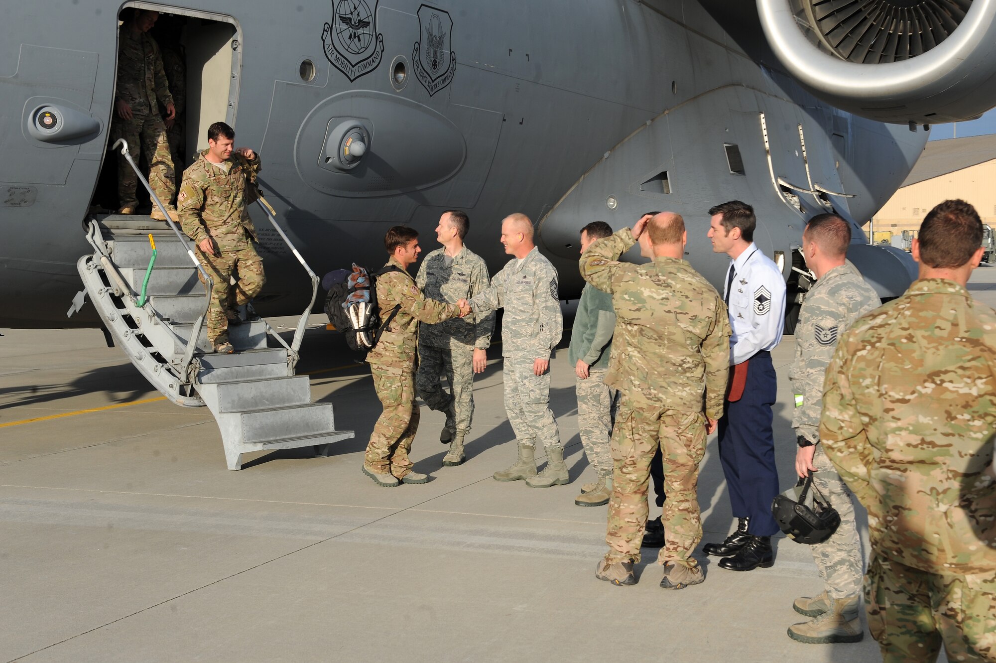 Airmen from the 38th Rescue Squadron are welcomed home by base and squadron leadership at Moody Air Force Base, Ga., Jan. 9, 2012. The members returned from a deployment to the horn of Africa. The 38th RQS provides survivor contact, treatment and extraction during combat and humanitarian rescue operations. (U.S. Air Force photo by Staff Sgt. Ciara Wymbs/Released)