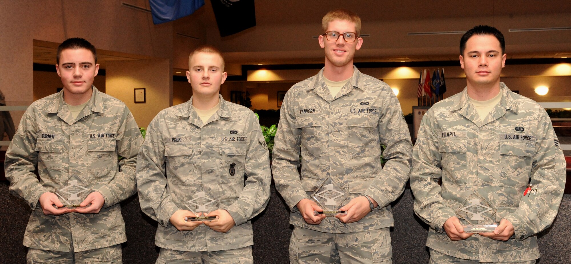 January’s Diamond Sharp Award recipients are (from left to right) Airman 1st Class Dustin Turner, 319th Communications Squadron; Airman Jedidiah Polk, 319th Security Forces Squadron; Airman 1st Class Derek Vanhorn, 319th Air Base Wing Public Affairs; Senior Airman Jan Vincent  Pilapil, 319th Force Support Squadron.  (U.S. Air Force photo by Airman 1st Class Xavier Navarro)