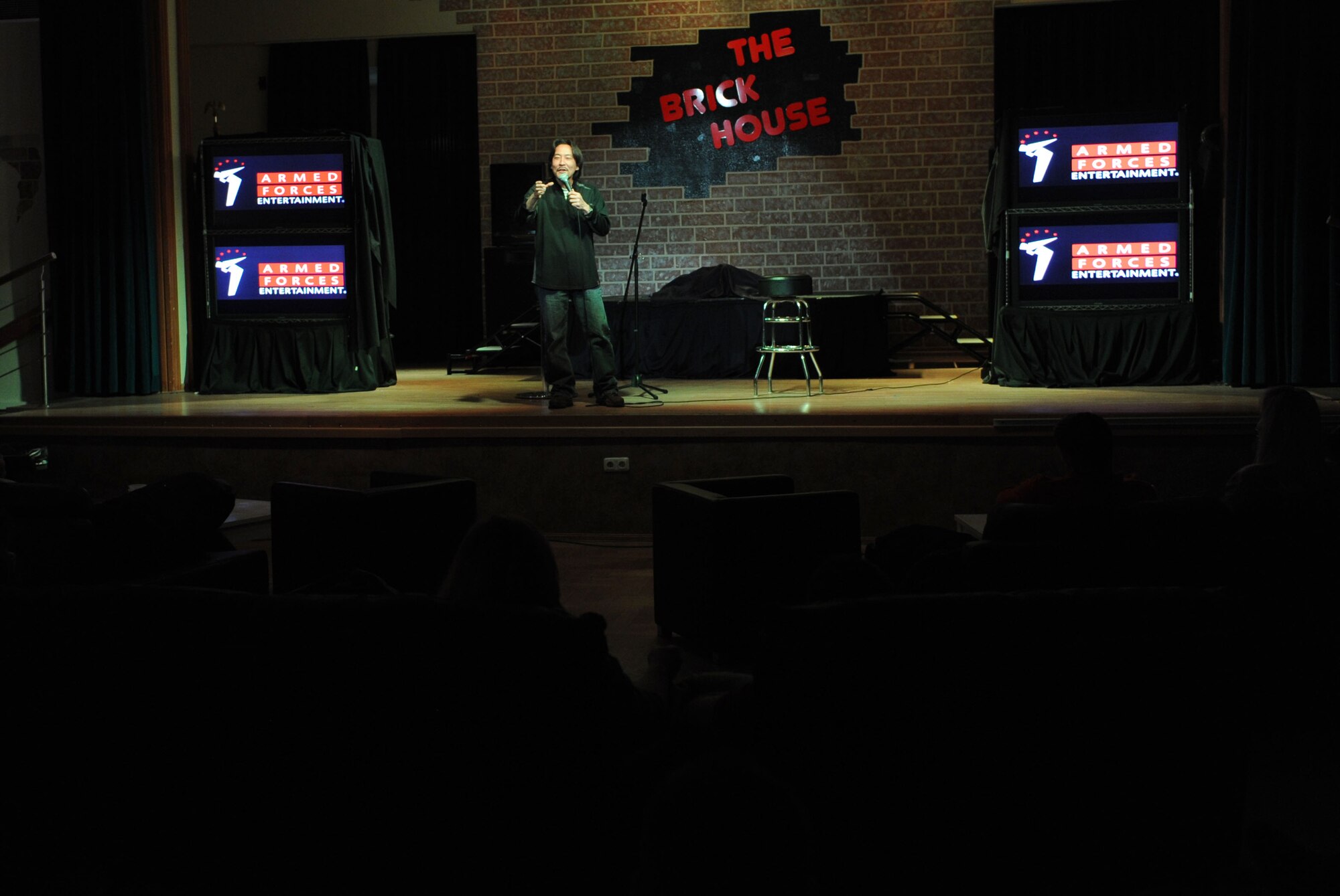 SPANGDAHLEM AIR BASE, Germany – Comedian Bob Kubota, has appeared on nearly a dozen comedy programs featuring stand-ups from Comedy Central to A&E and MTV, performs during an Armed Forces Entertainment show at the Brick House here Jan. 9. AFE provides entertainment to U.S. military members overseas hosting more than 1,200 shows around the world each year. (U.S. Air Force photo / Senior Airman Christopher Toon)