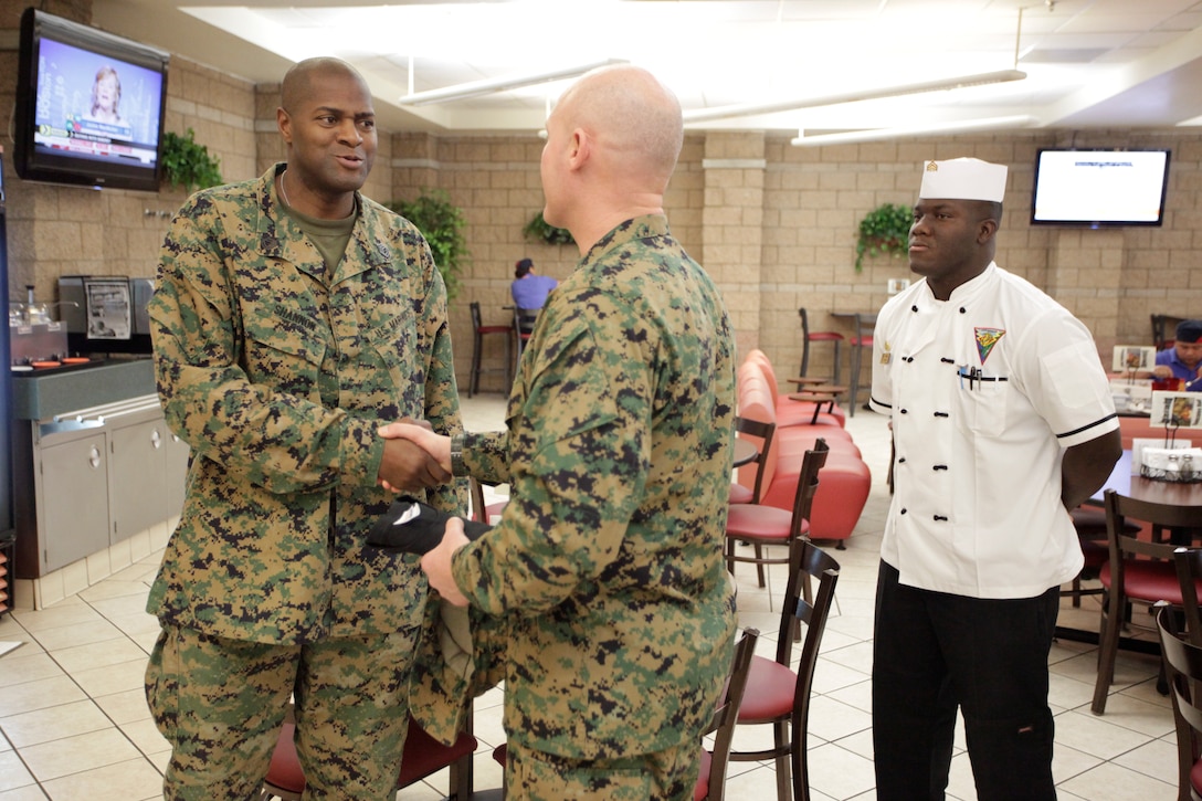 Sgt. Maj. Micheal P. Barrett, the 17th Sergeant Major of the Marine Corps, visits with Marines at Marine Corps Air Station Miramar, Calif., Jan. 10, 2012.