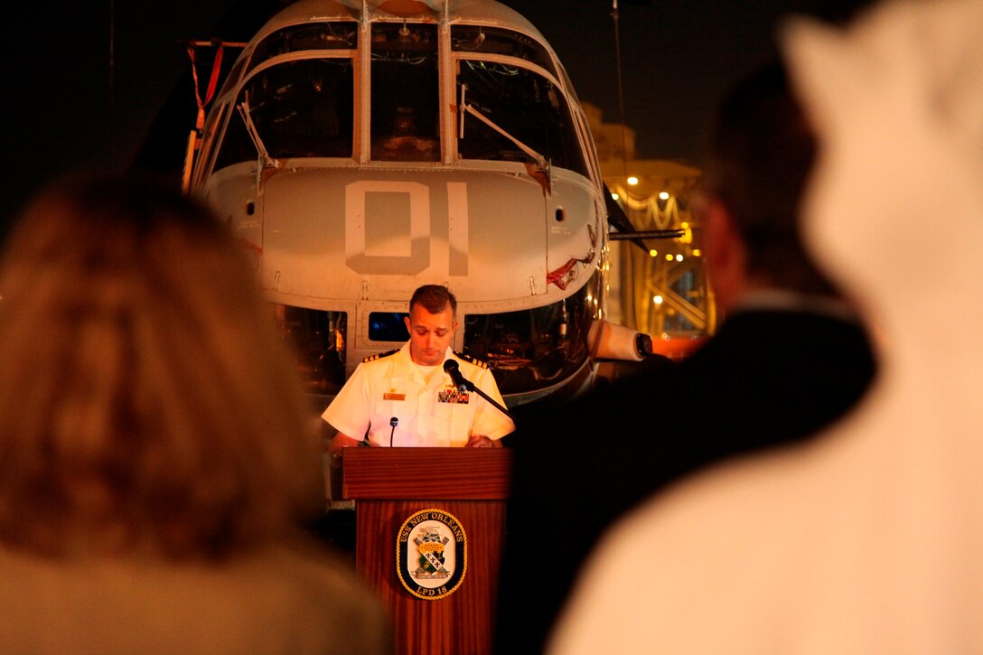 Cmdr. Dennis Jacko, commanding officer of amphibious transport dock ship USS New Orleans (LPD 18), speaks to guests during a reception here Jan 10. New Orleans and embarked Marines of  the 11th Marine Expeditionary Unit are deployed as part of the Makin Island Amphibious Ready Group as the U.S. Central Command theater reserve force, providing support for maritime security operations and theater security cooperation efforts in the U.S. 5th Fleet area of responsibility.