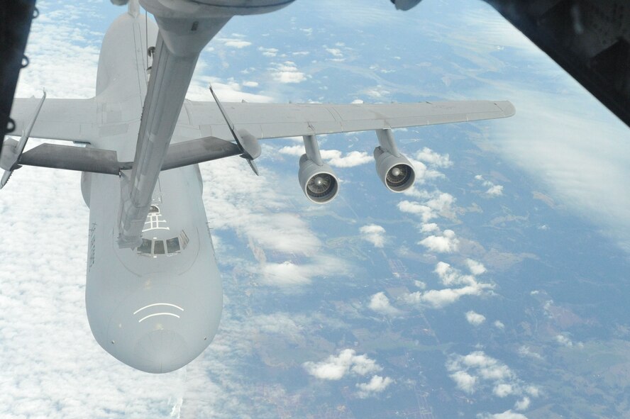 A C-5 Galaxy approaches a KC-10 Extender to be refueled over the coast of California during a training mission Dec. 14. (U.S. Air Force photo/ Airman 1st Class Nicole Leidholm)