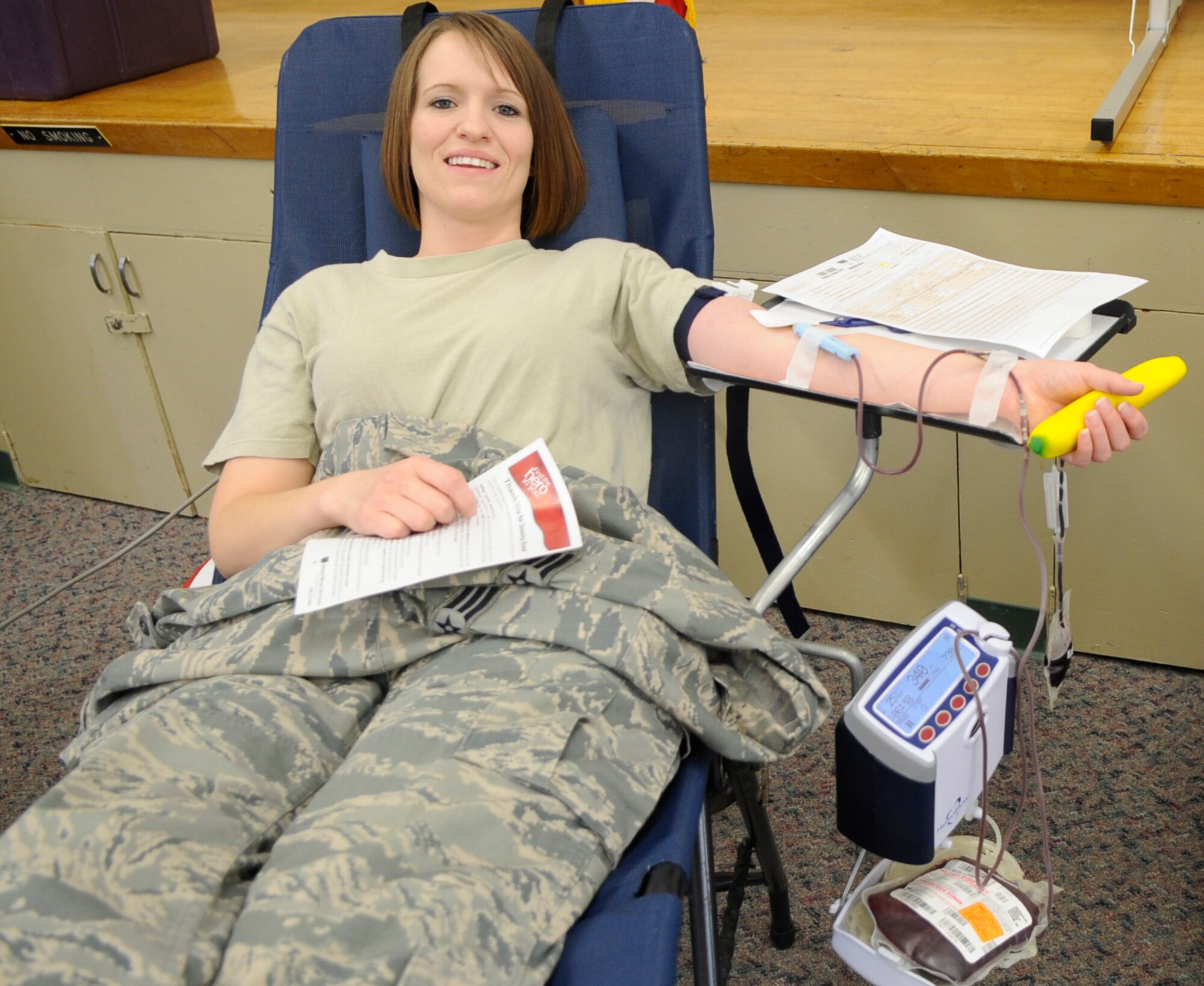 VANDENBERG AIR FORCE BASE, Calif. -- Senior Airman Penny McPherson, 30th Operations Group knowledge operator, donates blood at the education center student lounge here Wednesday, Jan. 11, 2012. United Blood Services are sponsored once per month by various Vandenberg organizations for an event.(U.S. Air Force photo/Tech. Sgt Scottie T. McCord)