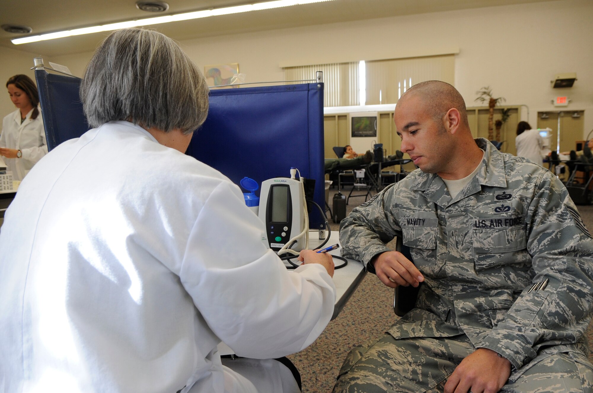 VANDENBERG AIR FORCE BASE, Calif. – Tech Sgt. William Mavity, 30th Communications Squadron unit training manager, answers the pre-screening questionnaire to ensure that he is qualified to donate blood.  United Blood Services are sponsored once per month by various Vandenberg organizations for an event. (U.S. Air Force photo/Tech. Sgt Scottie T. McCord)  
