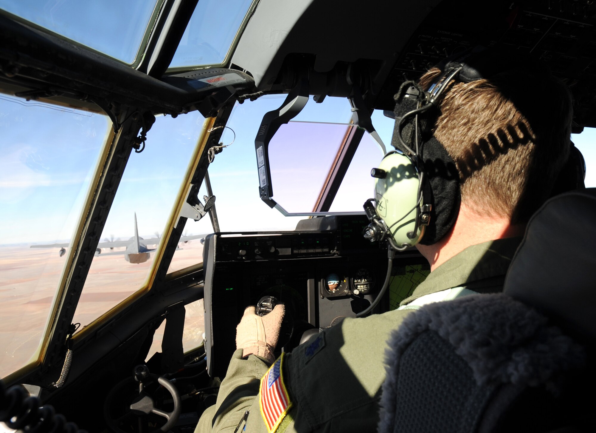 A pilot with the 522nd Special Operations Squadron flies an MC-130J Combat Shadow II aircraft, over the skies of New Mexico, Jan. 5, 2012.  The 522nd SOS, assigned to Cannon Air Force Base, N.M., flies the MC-130J which provides capabilities such as in-flight refueling, infiltration/exfiltration and aerial delivery resupply of special operations forces.  (U.S. Air Force photo by Airman 1st Class Alexxis Pons Abascal)