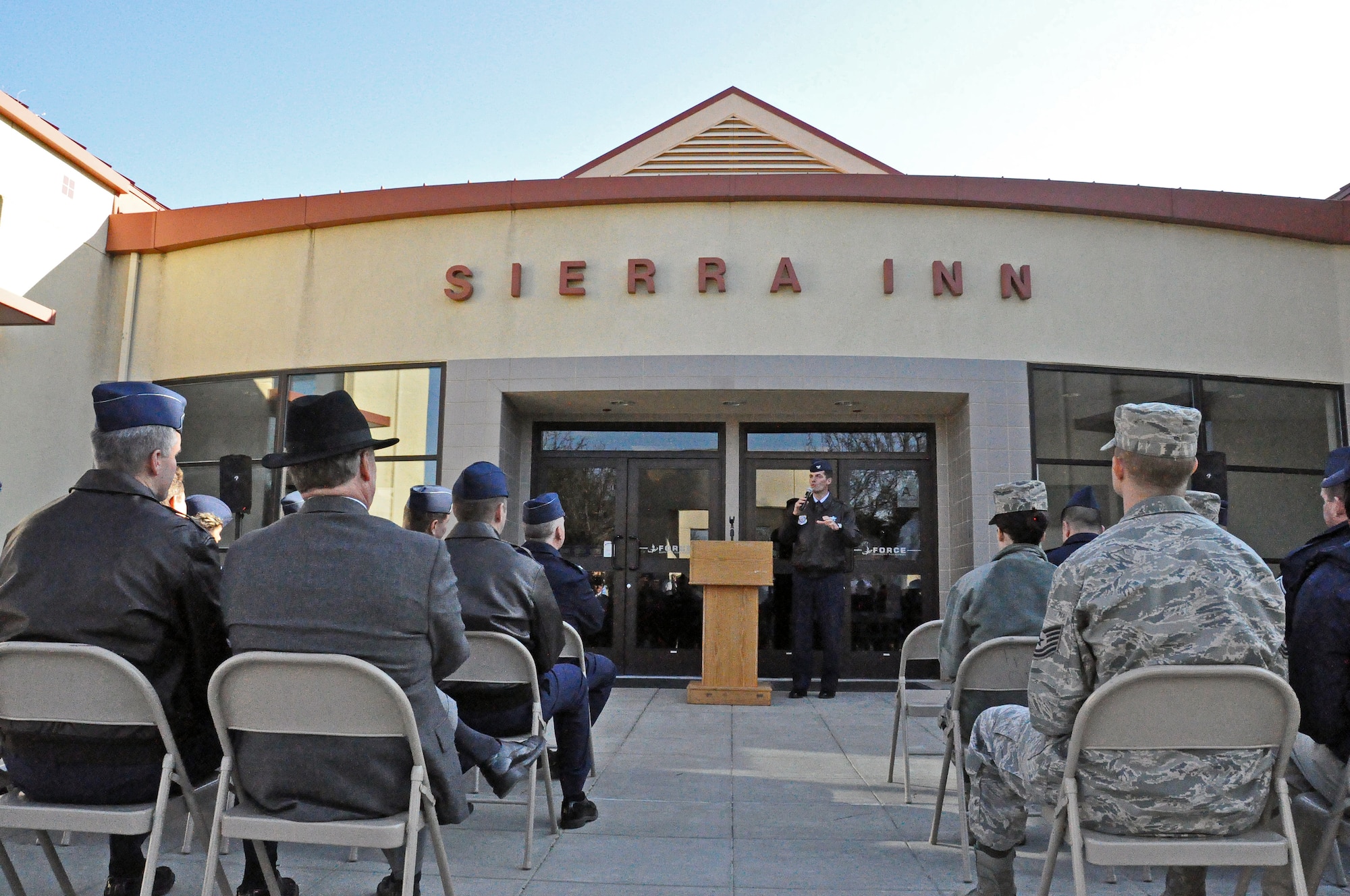Col. Dwight Sones, 60th Air Mobility Wing commander, speaks to the crowd Monday before symbolically cutting the ribbon to officially open the renovated Sierra Inn Dining Facility on Travis. (U.S. Air Force photo/ Airman 1st Class Madelyn Ottem)