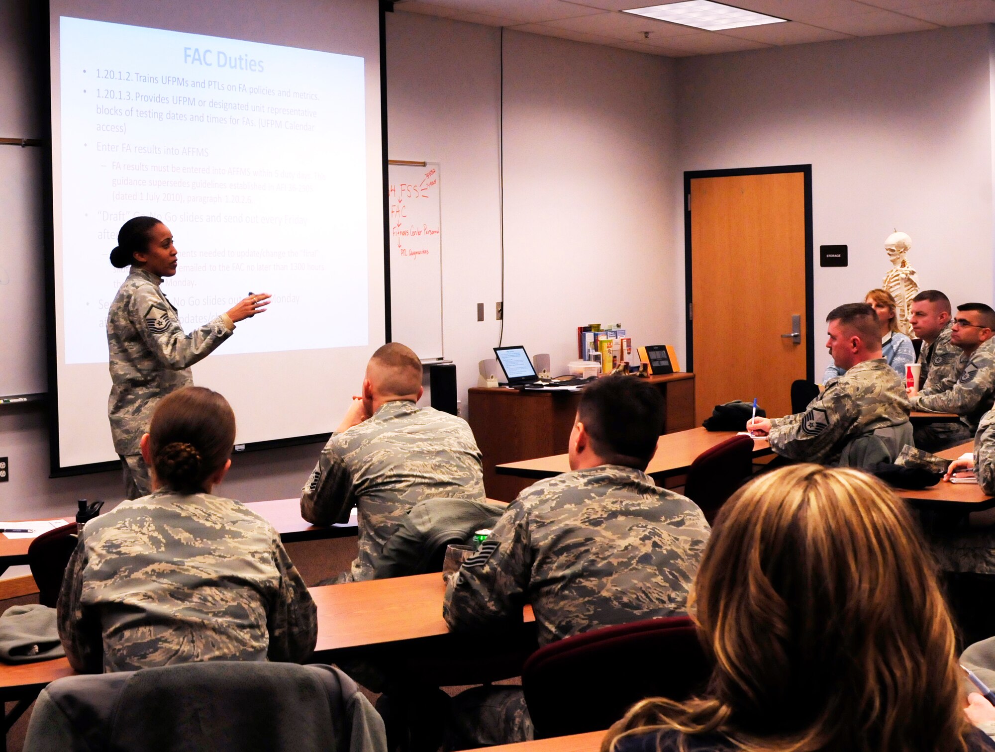 Master Sgt. Albertine Stewart instructs a course allowing Airmen to administer and monitor official fitness assessments, Jan. 6. 2012, Eielson Air Force Base, Alaska. Volunteer opportunities are now open to all Airmen to become a Physical Training Leader and conduct physical fitness training and testing. Stewart is the 354th Force Support Squadron fitness and sports manager. (U.S. Air Force photo by Airman 1st Class Zachary Perras)