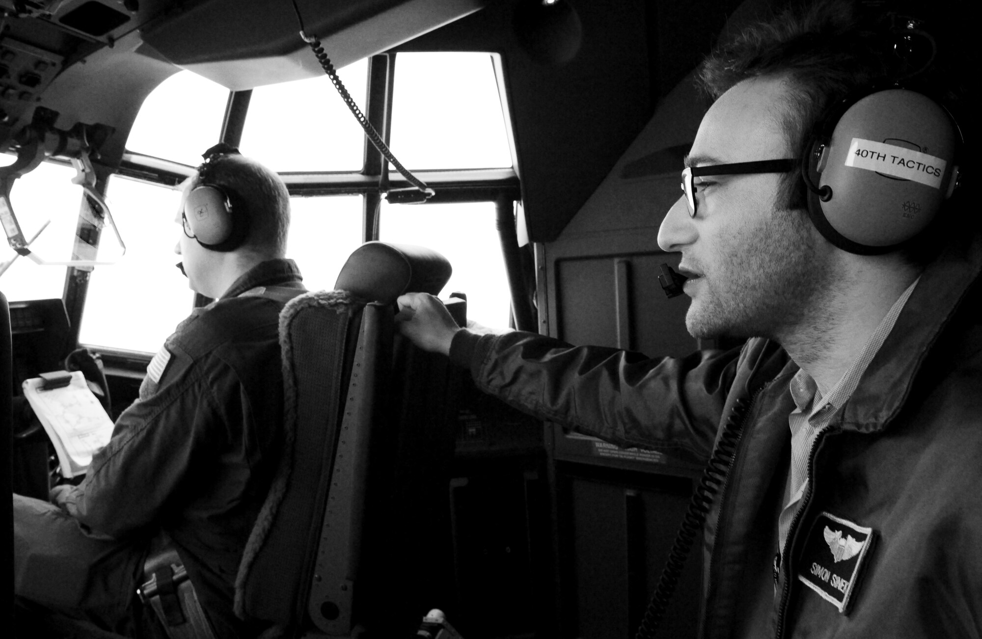 Simon Sinek, guest speaker, flies in a C-130 J-model during a base tour, Jan. 9, 2012, at Dyess Air Force Base, Texas. Sinek is known for speaking with different leaders and organizations, including: Microsoft, Dell, and multiple government agencies and entrepreneurs about the concept of why; explaining why people are inspired by leaders, messages and organizations over others.(U.S. Air Force photo by Airman 1st Class Jonathan Stefanko/ Released)
