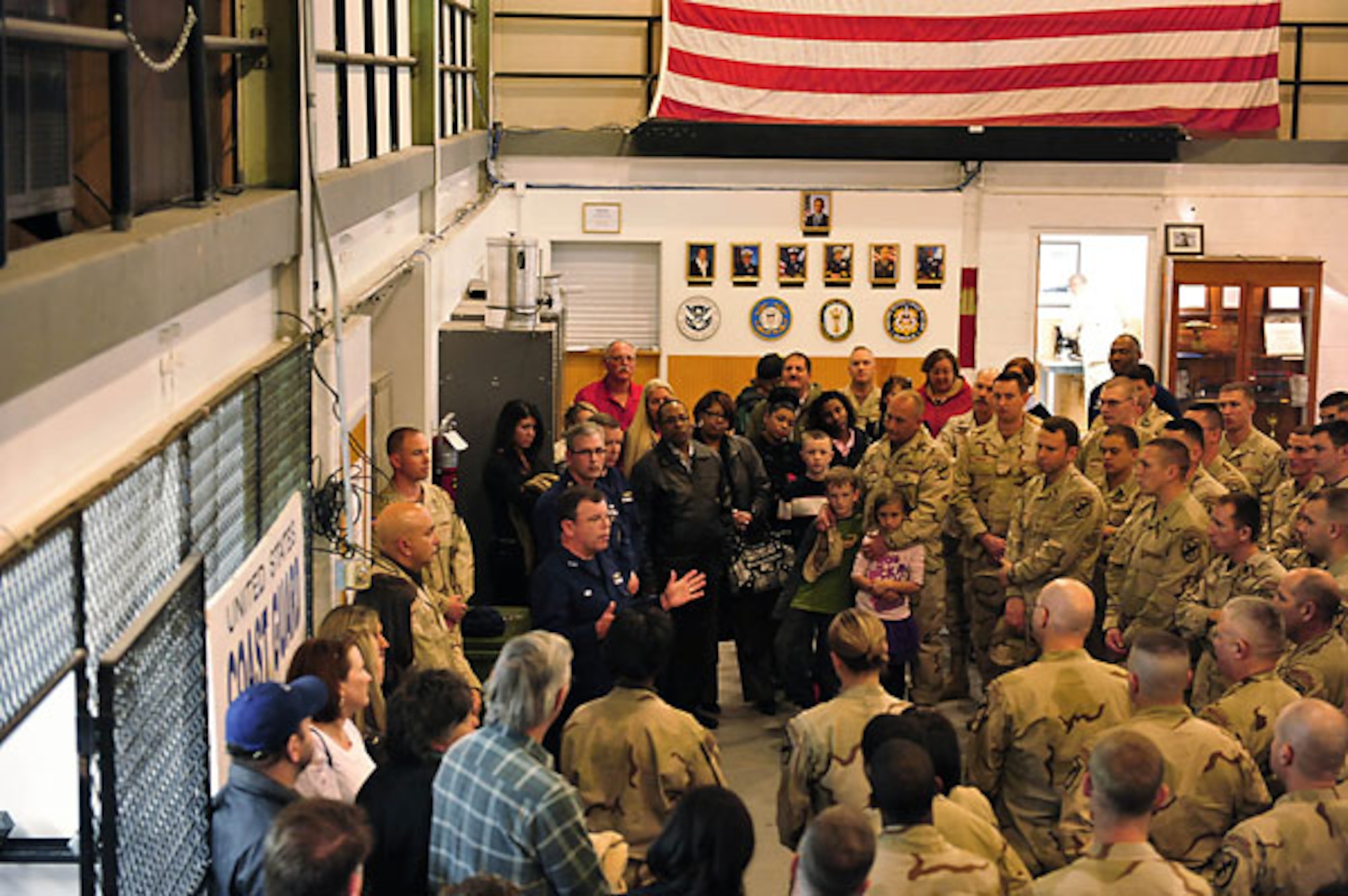 U.S. Coast Guard Rear Adm. Coast Guard Atlantic Area deputy commander, holds an all-hands session with Port Security 305 Jan. 3, 201, before the team deployed to the Middle East. The unit, which is based out of Fort Eustis' U.S. Army Transportation Center, will provide seaward security at strategic port locations around the North Arabian Gulf ensuring the free flow of personnel, equipment and commerce in the region during the six month deployment. (U.S. Coast Guard photo by Petty Office 2nd Class Michael Anderson/Released)

