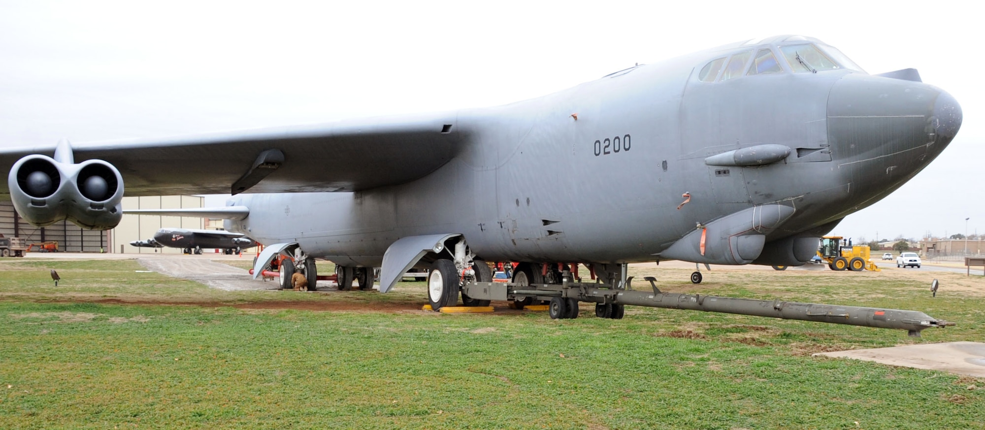 The new B-52 static is positioned in place and prepared to be permanently mounted on stands.  The B-52 is replacing the “City of Burkburnett” B-52 that has sat as a static display since 1991, before sustaining damage from the outdoor elements, causing it to need replacement. (U.S. Air Force Photo/ Josh Wilson)