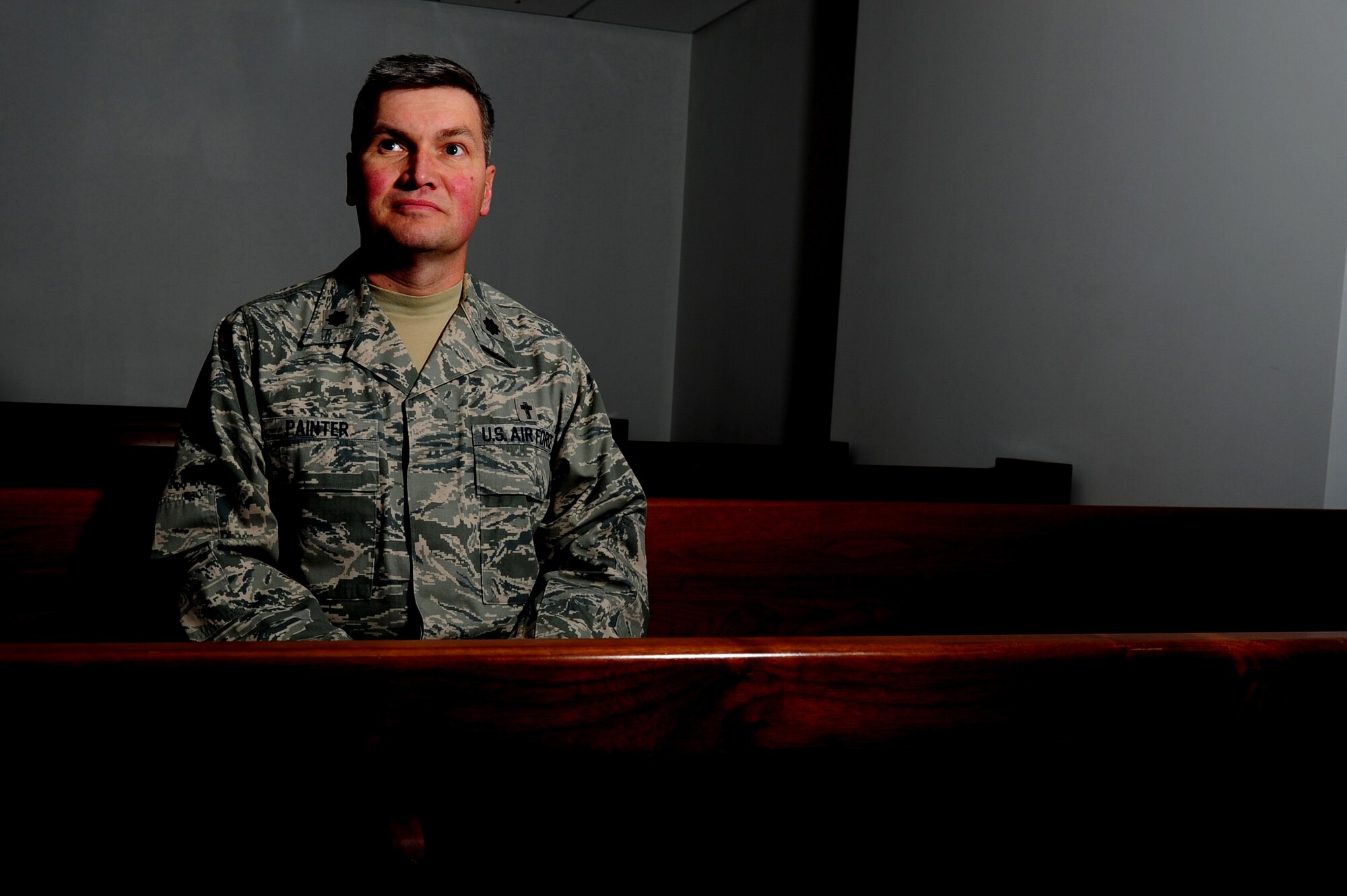 Lt. Col. John Painter finds himself at home in the pews at the Ralph
H. Johnson Veteran's Affairs Medical Center chapel in Charleston, S.C., Jan
5. Painter, the 315th Airlift Wing chaplain has been an Air Force Reserve
chaplain for 15 years and also works as a chaplain at the VA hospital.
Military chaplains serve as everyday spiritual needs ministers and provide
religious counseling to service members and their families. (U.S. Air Force
photo/ Staff Sgt. Nicole Mickle)  
