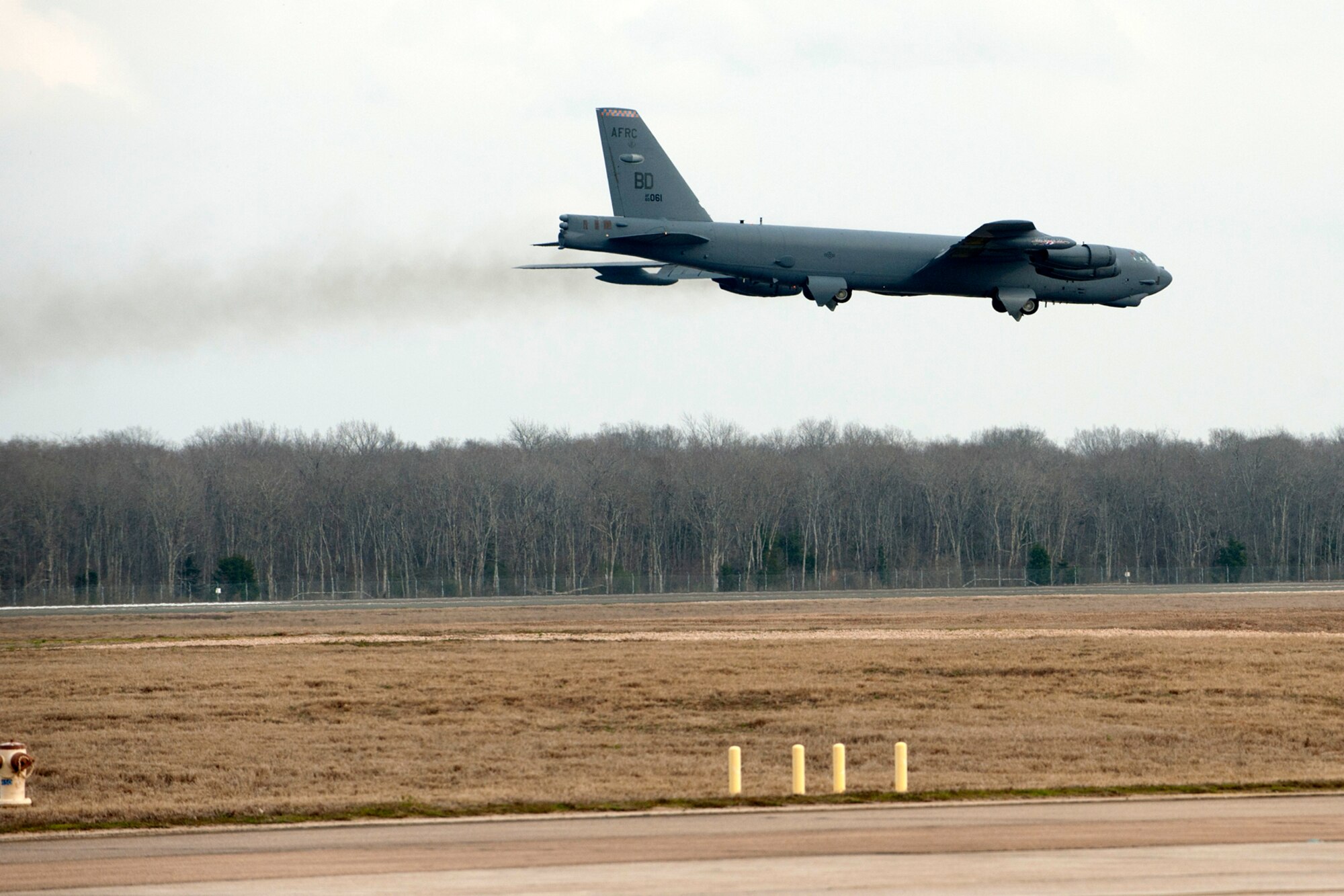 A 93rd Bomb Squadron B-52H Stratofortress passes over the runway at Barksdale Air Force Base, La., after returning from a sortie, Jan. 8, 2012. Aboard the aircraft is U.S. Air Force Lt. Col. Chris Rounds, 307th Bomb Wing Chief of Standardization and Evaluation, who is retiring from the Air Force Reserve and this marked his last flight in a B-52. (U.S. Air Force photo by Master Sgt. Greg Steele/Released)