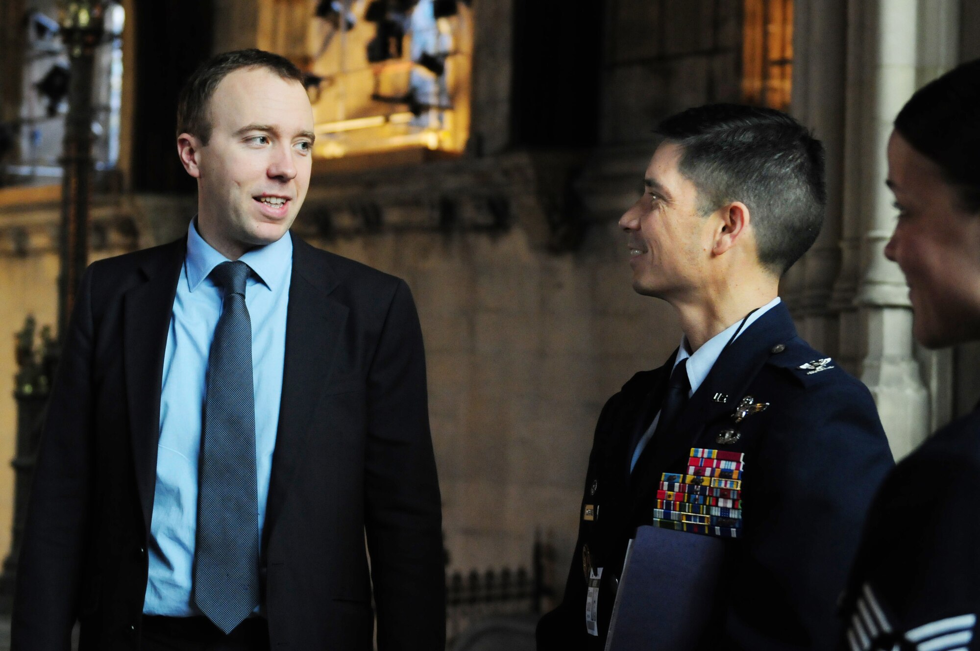 LONDON, England -- Matthew Hancock (left), Member of Parliament for West Suffolk, speaks with Col. John Quintas, 48th Fighter Wing commander, during a visit to the Houses of Parliament, Jan. 10, 2012. Members of the Liberty Wing visited Westminster and met informally with MPs from the constituencies where RAFs Lakenheath, Mildenhall and Feltwell are located. (U.S. Air Force photo by Senior Airman Lausanne Morgan)