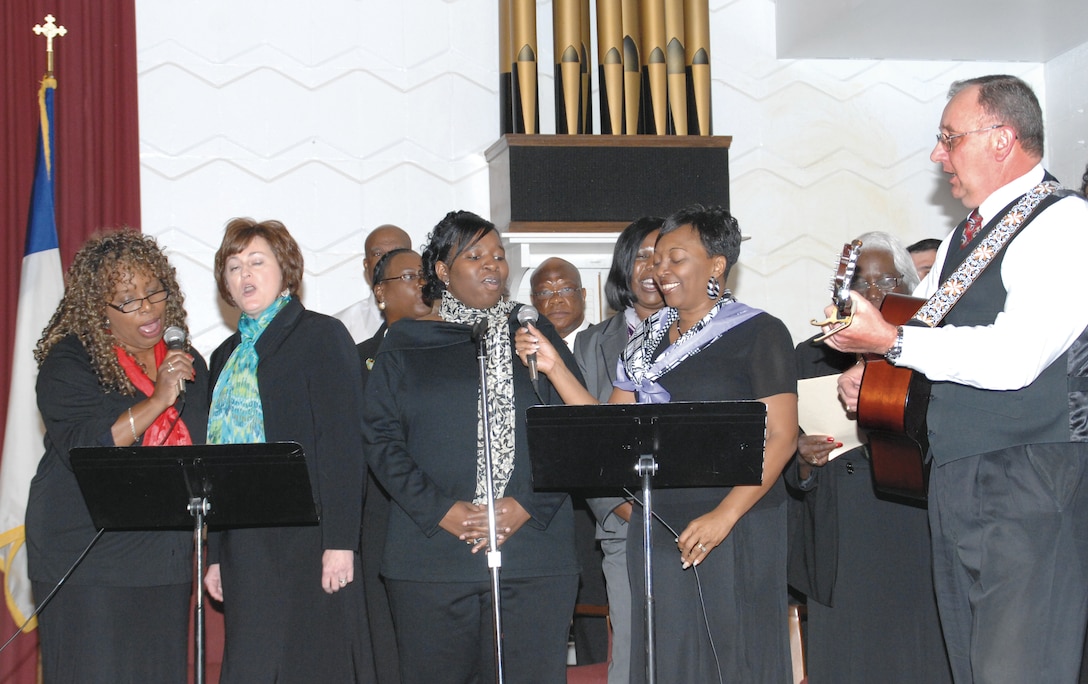 The Marine Corps Logistics Base Albany Gospel Choir performs a musical selection during the Blacks in Government Dr. Martin Luther King Jr. ceremony held at the Base Chapel, Jan. 10.