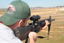 SAN DIEGO -- Ryan Sladek, an educator from the Chicago area sights in down range with an M16A4 during a life fire drill Jan. 12. Sladek, with 38 other educators from the Chicago area participated in the 2012 Educators Workshop. For more photos and information visit www.facebook.com/mcrschicago. (U.S. Marine Corps photo by Sgt. George J. Papastrat) (Released0