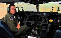 U.S. Air Force Capt. Andy Rowcliffe, 14th Airlift Squadron aircraft commander, looks back for a moment while performing preflight duties, Jan. 10, 2012. Three C-5s and a C-17 landed at Shaw Air Force Base S.C., over a three-day period to pick up Airmen and aerospace ground equipment in support of a deployment tasking. (U.S. Air Force Photo by Senior Airman Neil D. Warner/Released)