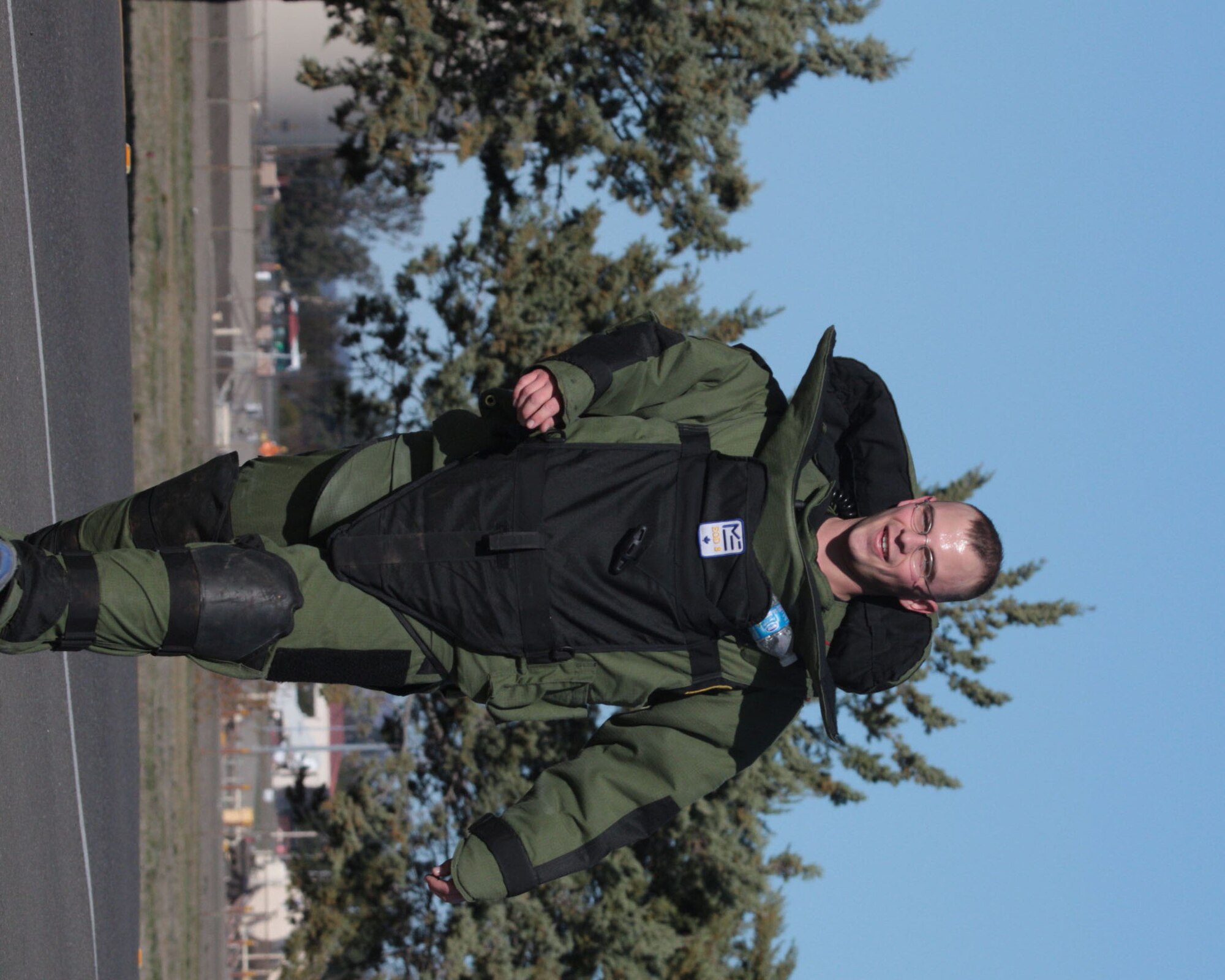TRAVIS AIR FORCE BASE, Calif. - Senior Airman Chris P. Savage, 9th Civil Engineer Squadron, Beale Air Force Base, Calif., along with Travis Team members, came out and support the Wounded Warriors foundation recently during the 2011 Travis Bomb Suit Run sponsored by the 60th Civil Engineer Squadron. (U.S. Air Force photo/Anne Kohutanycz)