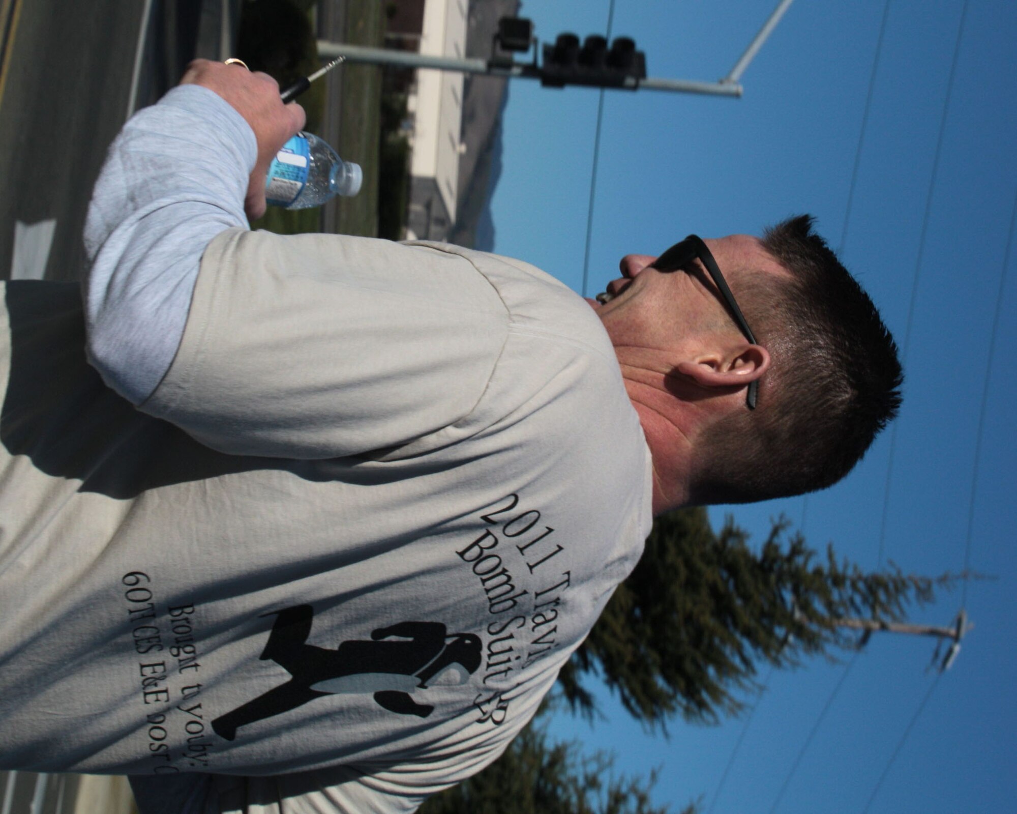 TRAVIS AIR FORCE BASE, Calif. - Chief Master Sgt. Mike McGillivray, 349th Mission Support Group, along with other Travis Team members, came out and support the Wounded Warriors foundation recently during the 2011 Travis Bomb Suit Run sponsored by the 60th Civil Engineer Squadron. (U.S. Air Force photo/Anne Kohutanycz)