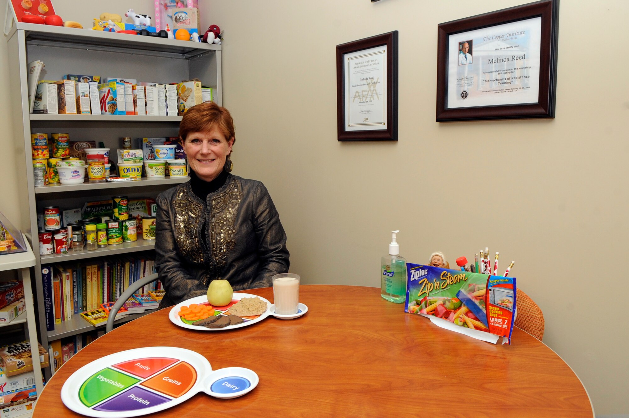 VANDENBERG AIR FORCE BASE, Calif. – Melinda Reed, the Health and Wellness Center’s health promotion dietitian, promotes healthy living through nutrition education and proper exercise here Wednesday, Jan. 11, 2012. Healthy eating and exercise classes are offered on the second and fourth Wednesdays of each month. Information on class times and registration is available online at https://eis.afspc.af.mil/unit/30sw/30mos/HP/HAWC. The HAWC may be contacted by phone at 805-606-2221, or by email at vandenberg.HAWC@vandenberg.af.mil . (U.S. Air Force photo/ Tech. Sgt. Scottie McCord) 
